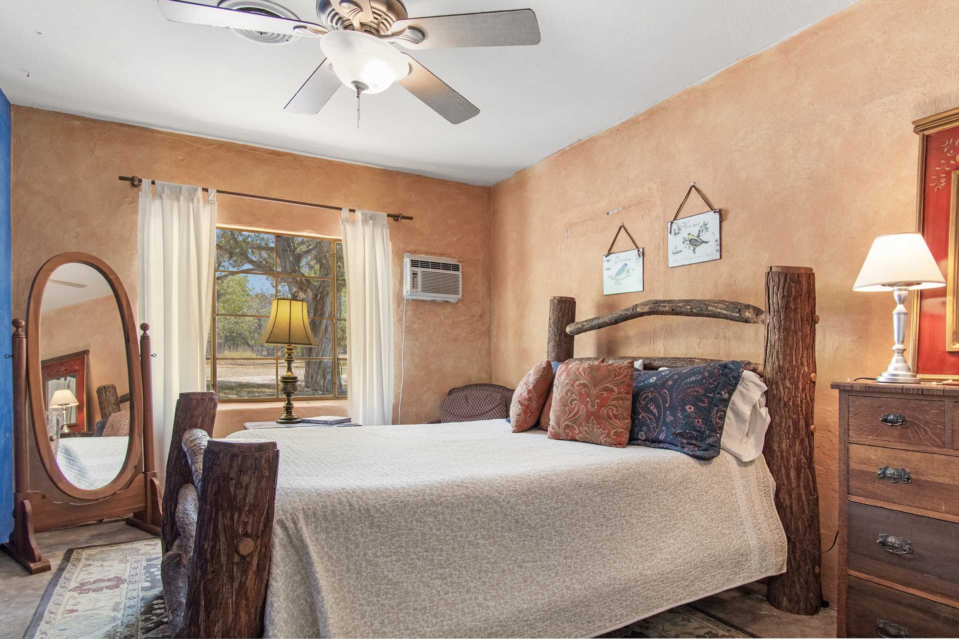                                                As seen in this bedroom, there are individual AC units and ceiling fans throughout the house to assure individual comfort!