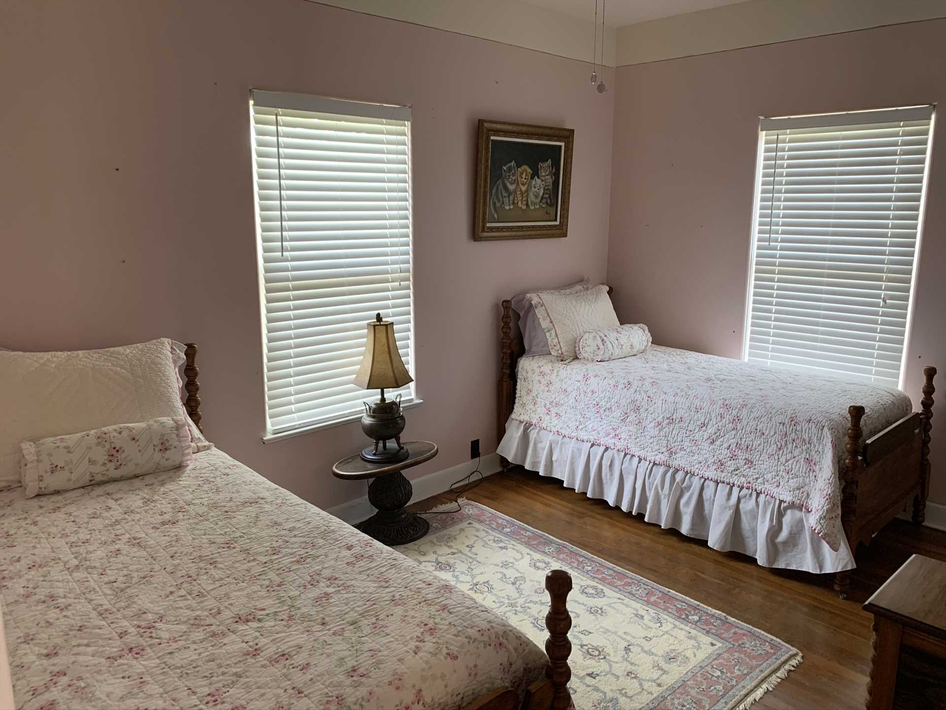                                                 Here's the fourth bedroom, with two twin beds. Overall, there's restful sleeping space for up to ten people, and all beds are covered with clean and comfy linens.