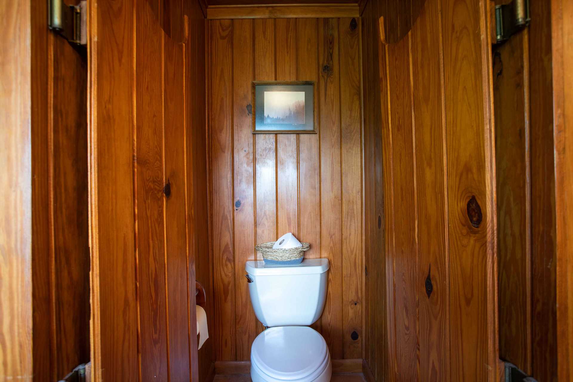                                                 A separate commode stall in the master bath provides extra privacy when needed.