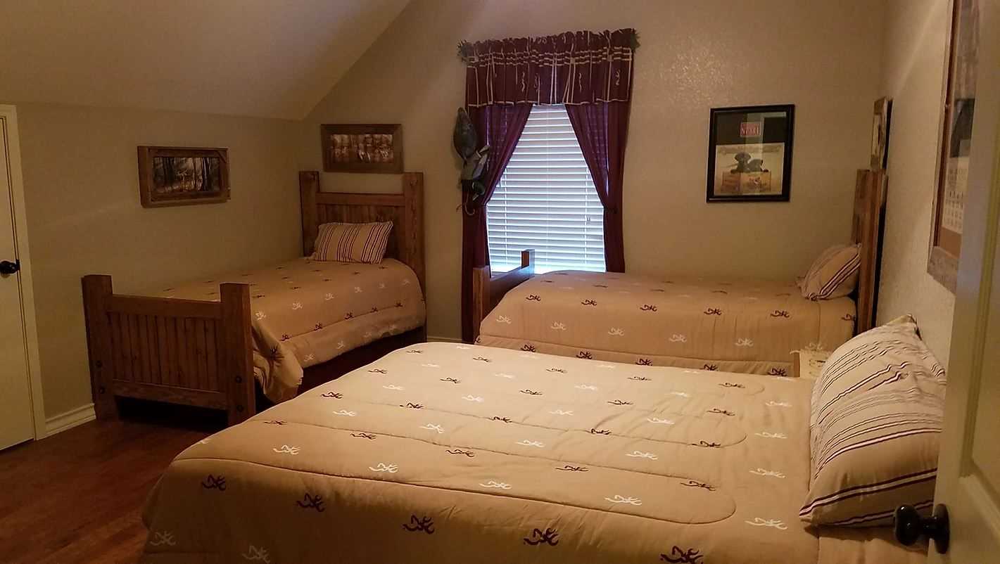                                                 The fourth and final bedroom features a queen and two twins-and all the clean and soft bed and bath linens are provided for your stay.
