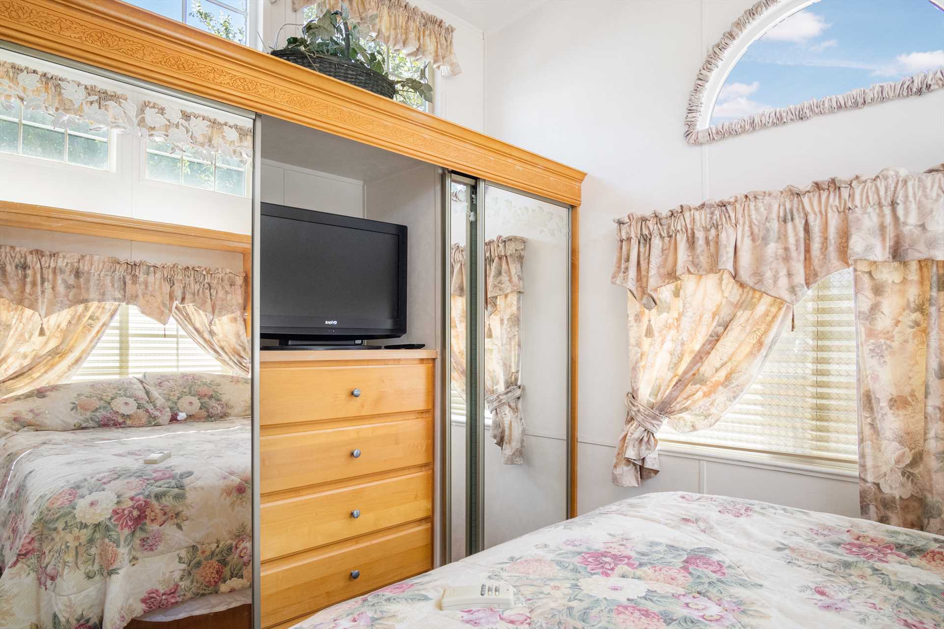                                                 There are two TVs at the Park Model Cabin: one in the living area, and one in the bedroom!