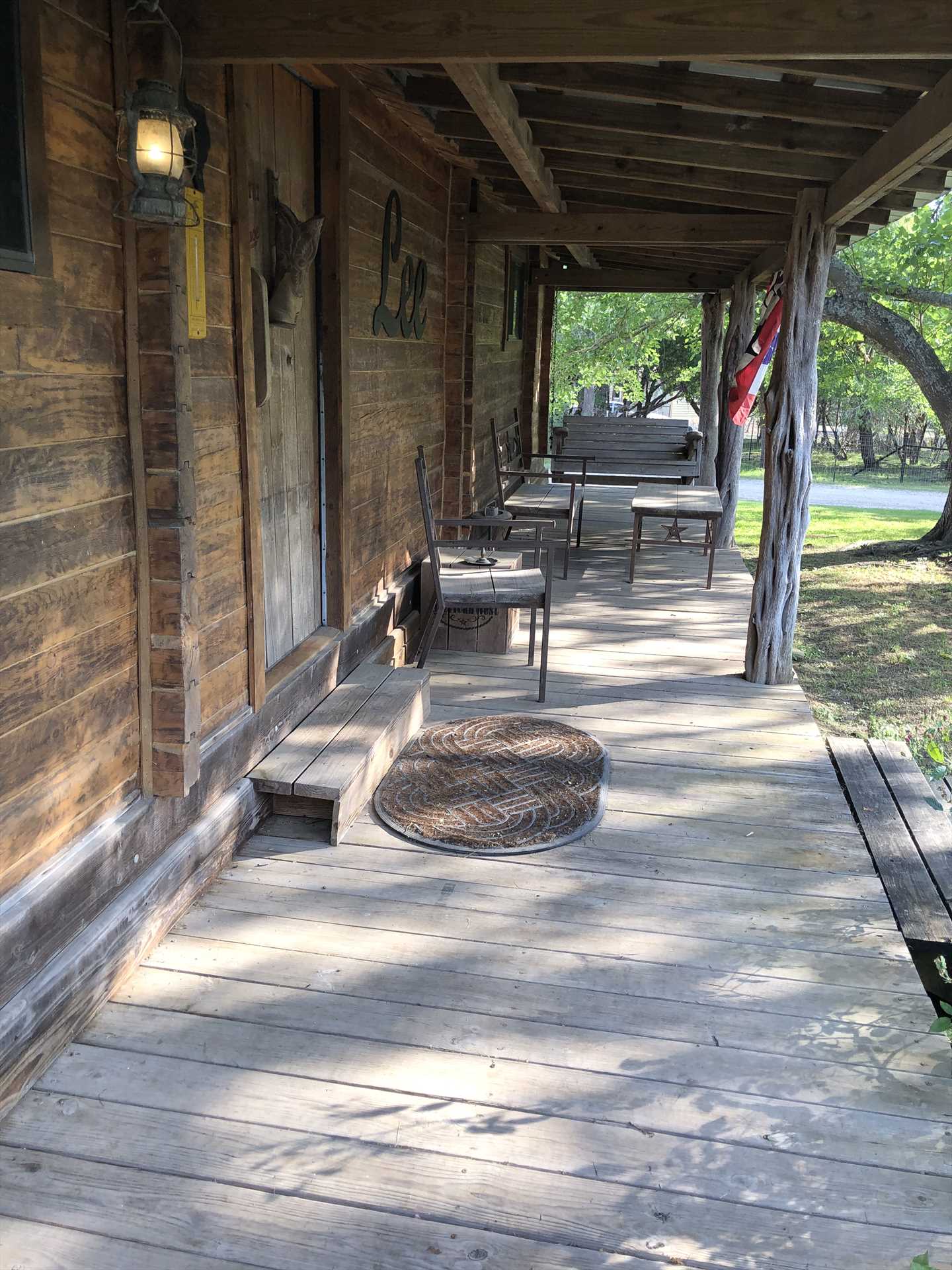                                                 The shady porch is a great place to sit and sip your favorite beverage-and there's a fenced enclosure for the safety of your pets and little ones.