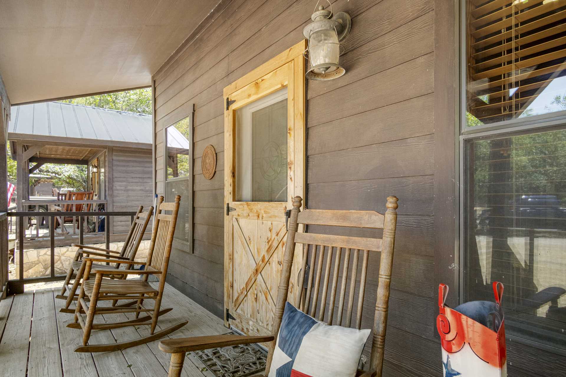                                                 Enjoy your morning coffee in a comfortable rocking chair on the shaded porch!