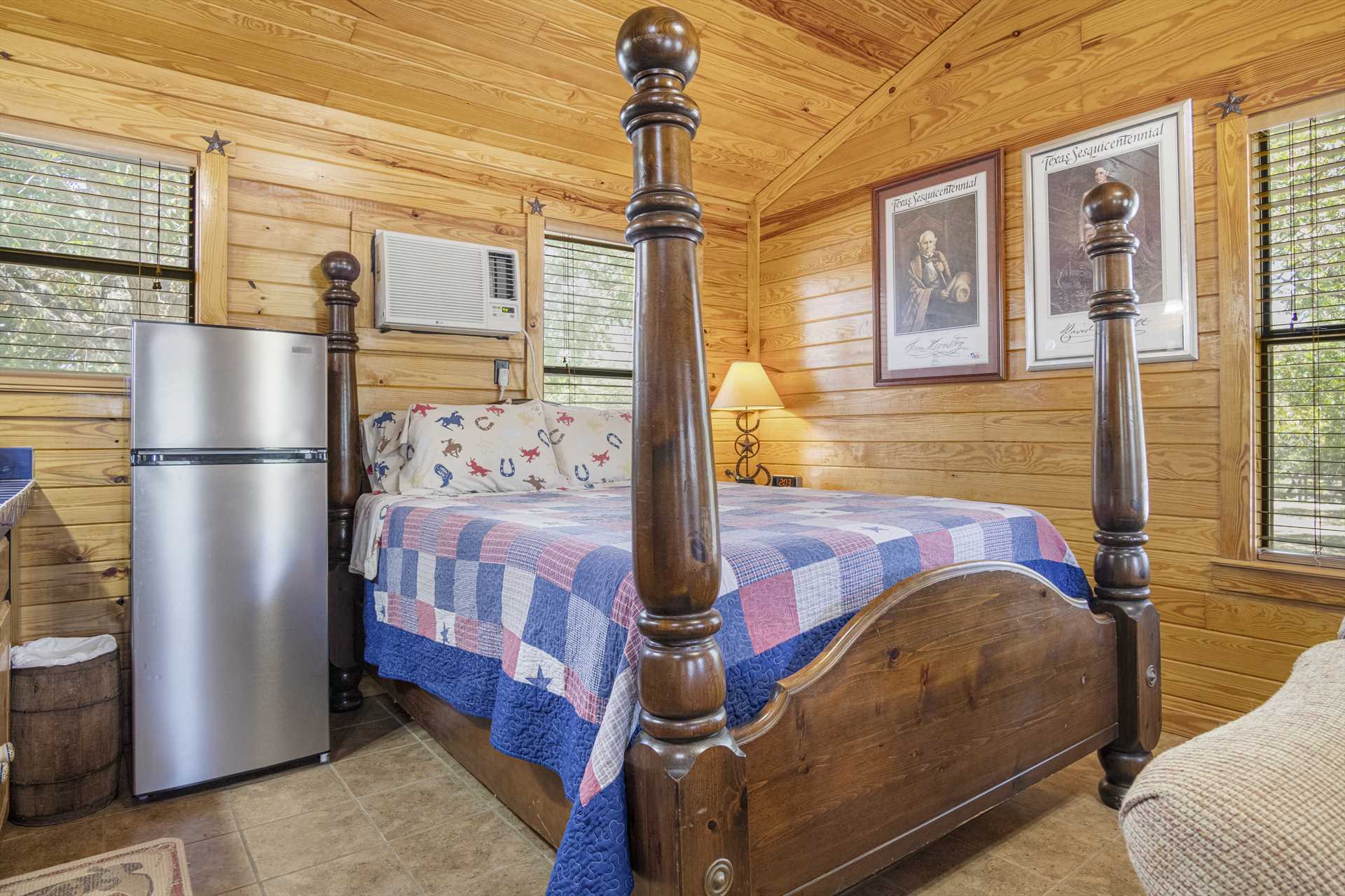                                                 Check out the vintage four-poster frame on the great big queen-sized bed! Overall, the Texan Cabin sleeps up to four people.