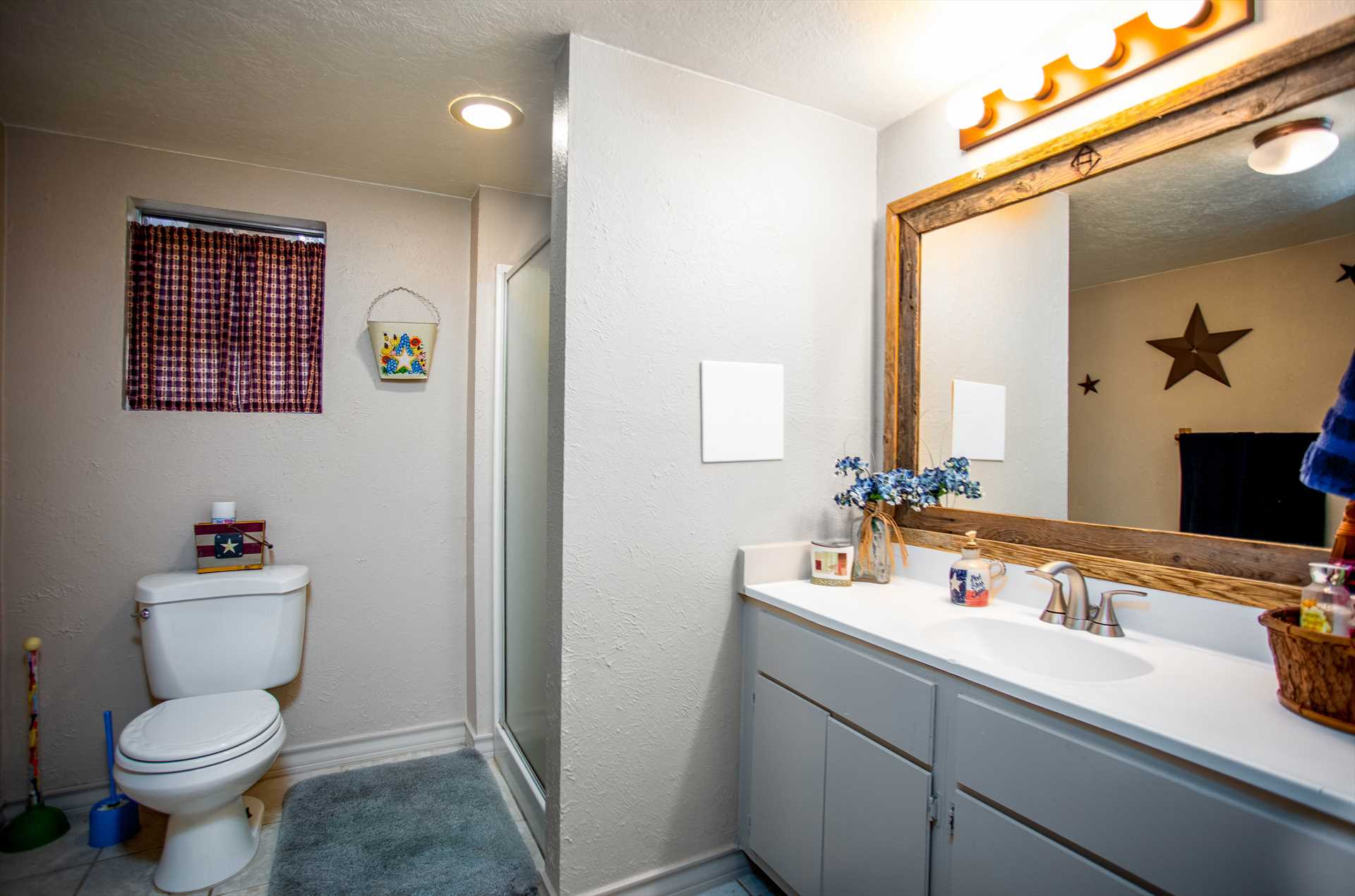                                                A walk-in shower and spacious vanity are two of the cleanup highlights in the spotless bathroom...and soft and fresh linens are provided.
