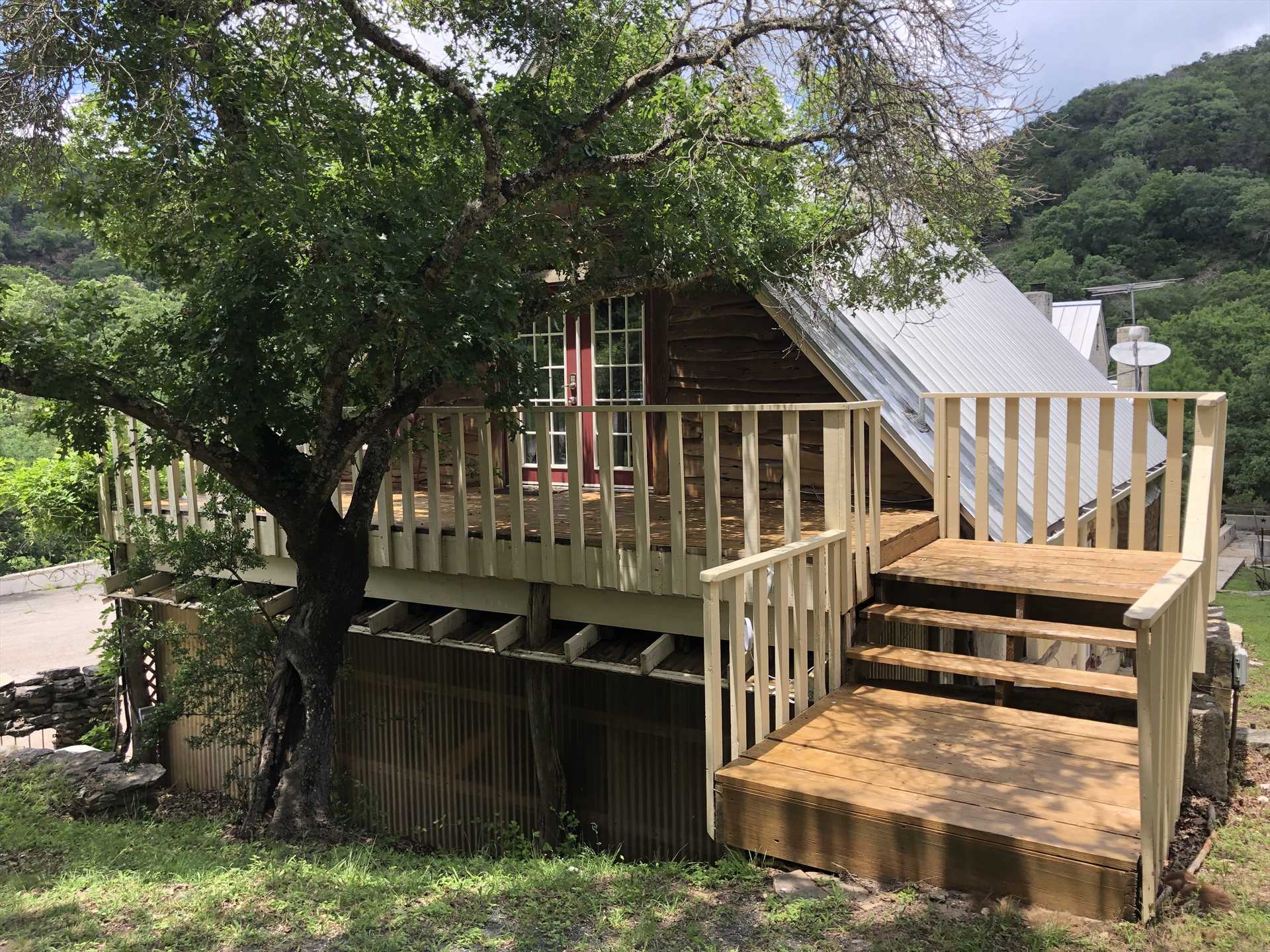                                                 Awaken your inner child with a stay at the fun and scenic Tree House Cabin!