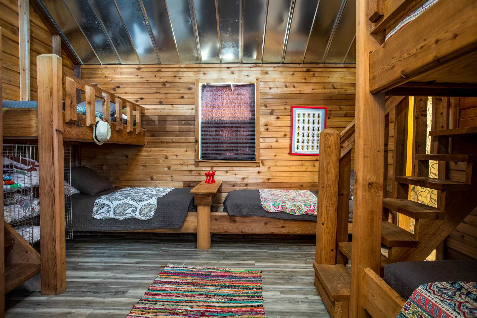                                                 Seven, count them-seven over-sized twin beds give the third bedroom a fun and comfortable bunkhouse feel!
