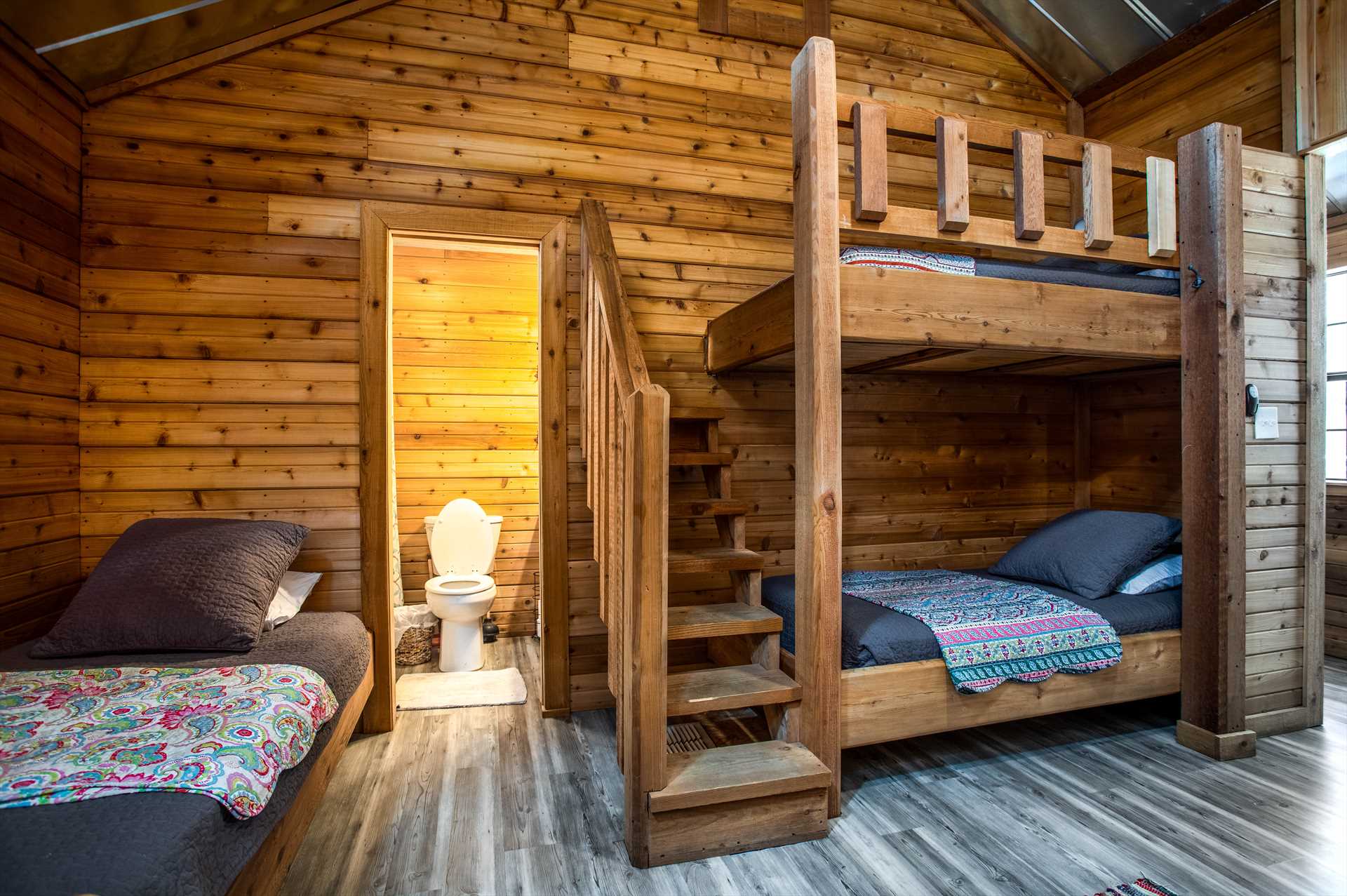                                                 The bunkhouse bedroom comes with its own dedicated full bath, which is also supplied with fresh linens.