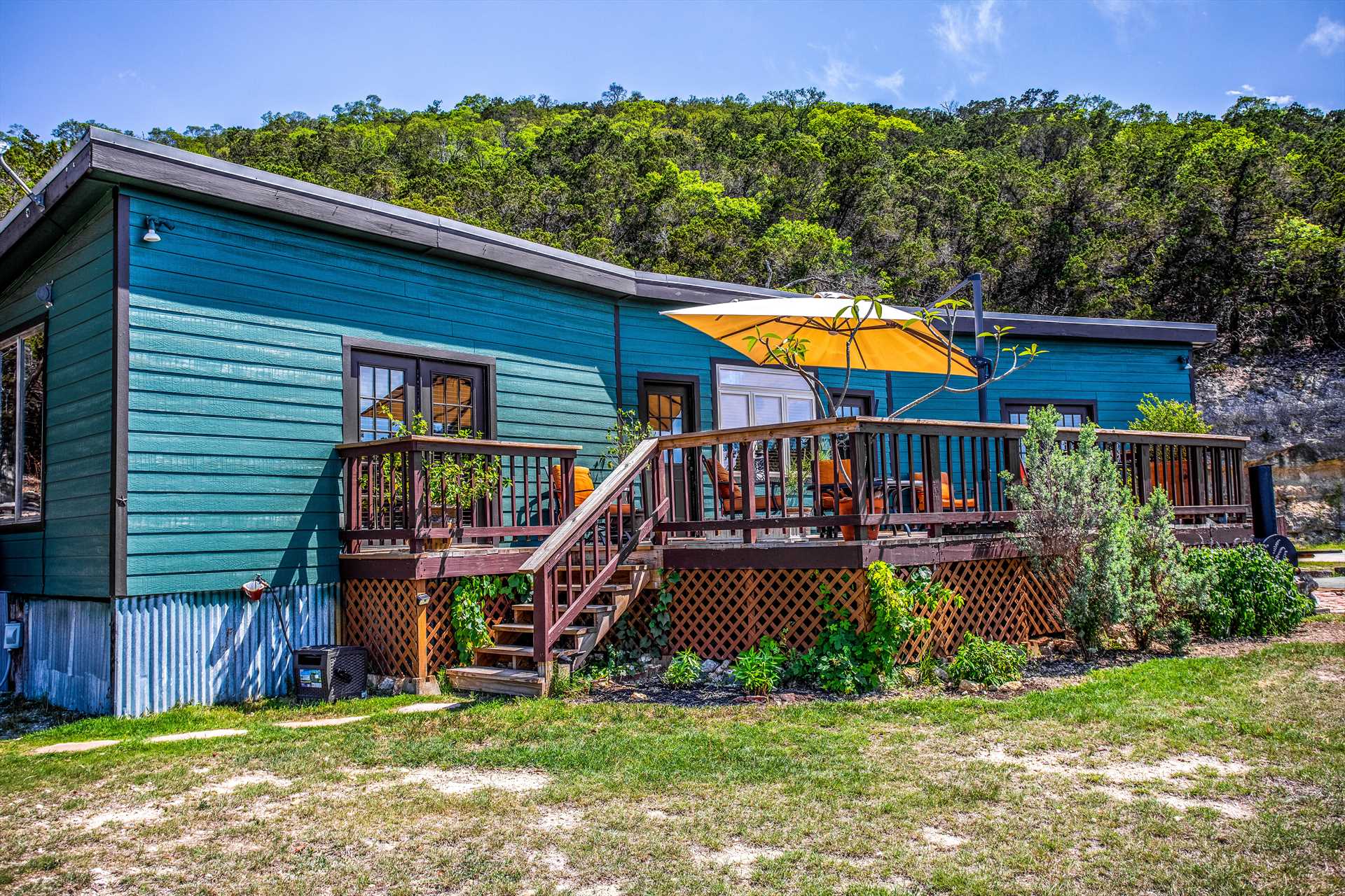                                                 A splash of color in the beautiful Hill Country! Make this picturesque and peaceful getaway cabin your home away from home.