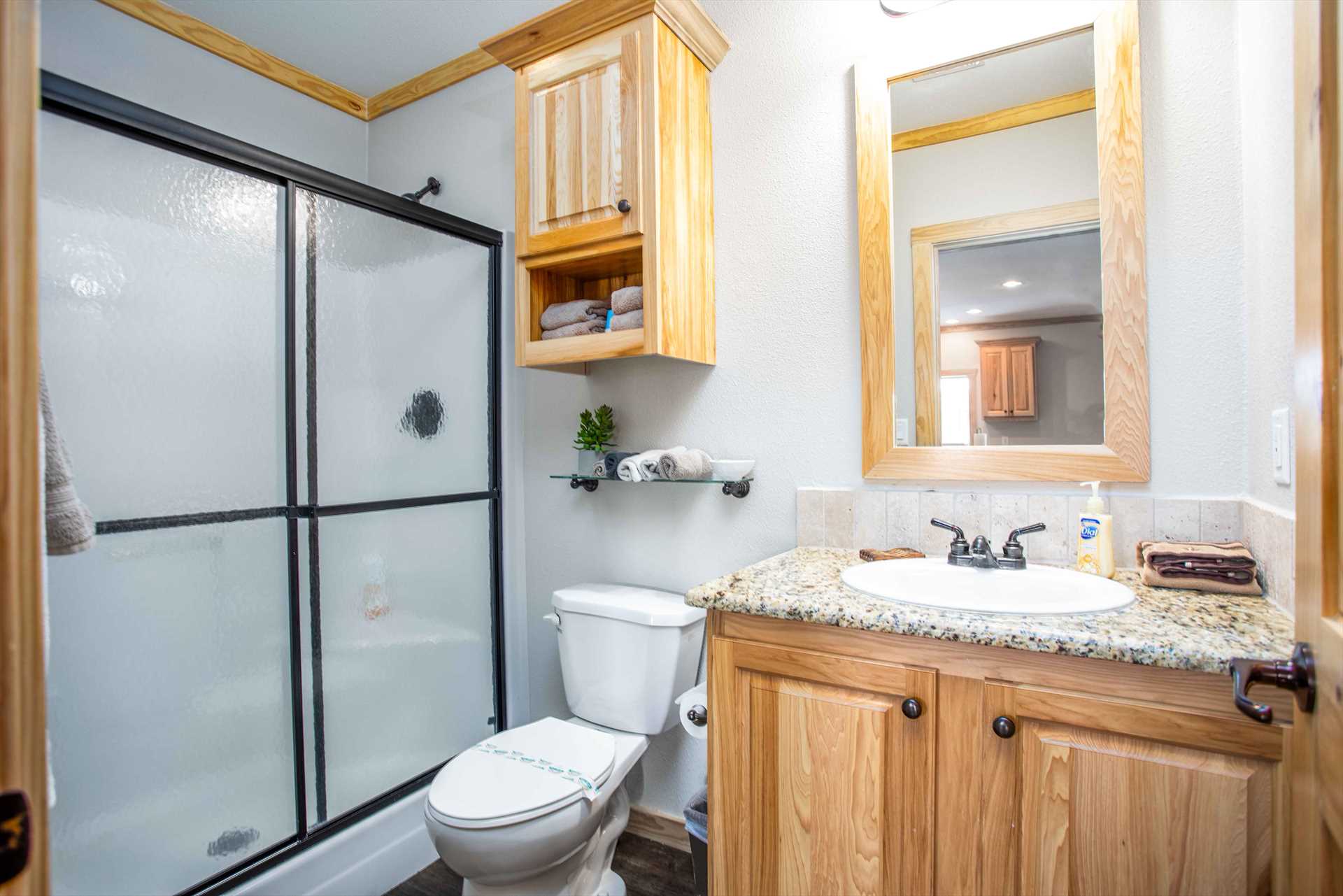                                                 The spotless second bathroom is equipped with a shower, and both baths include clean linens during your stay.