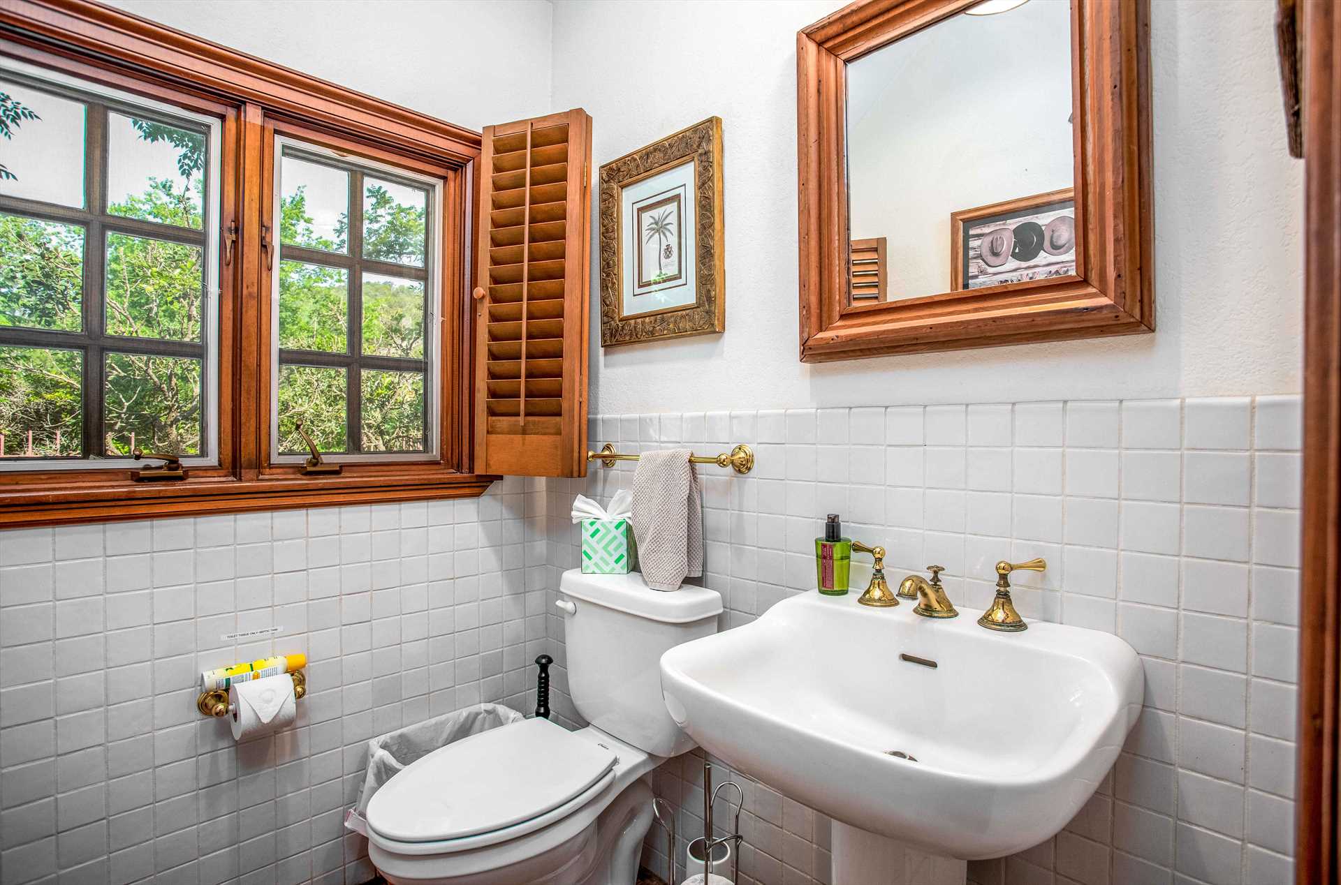                                                 A supplemental half-bath at the Homestead provides space for quick cleanup!