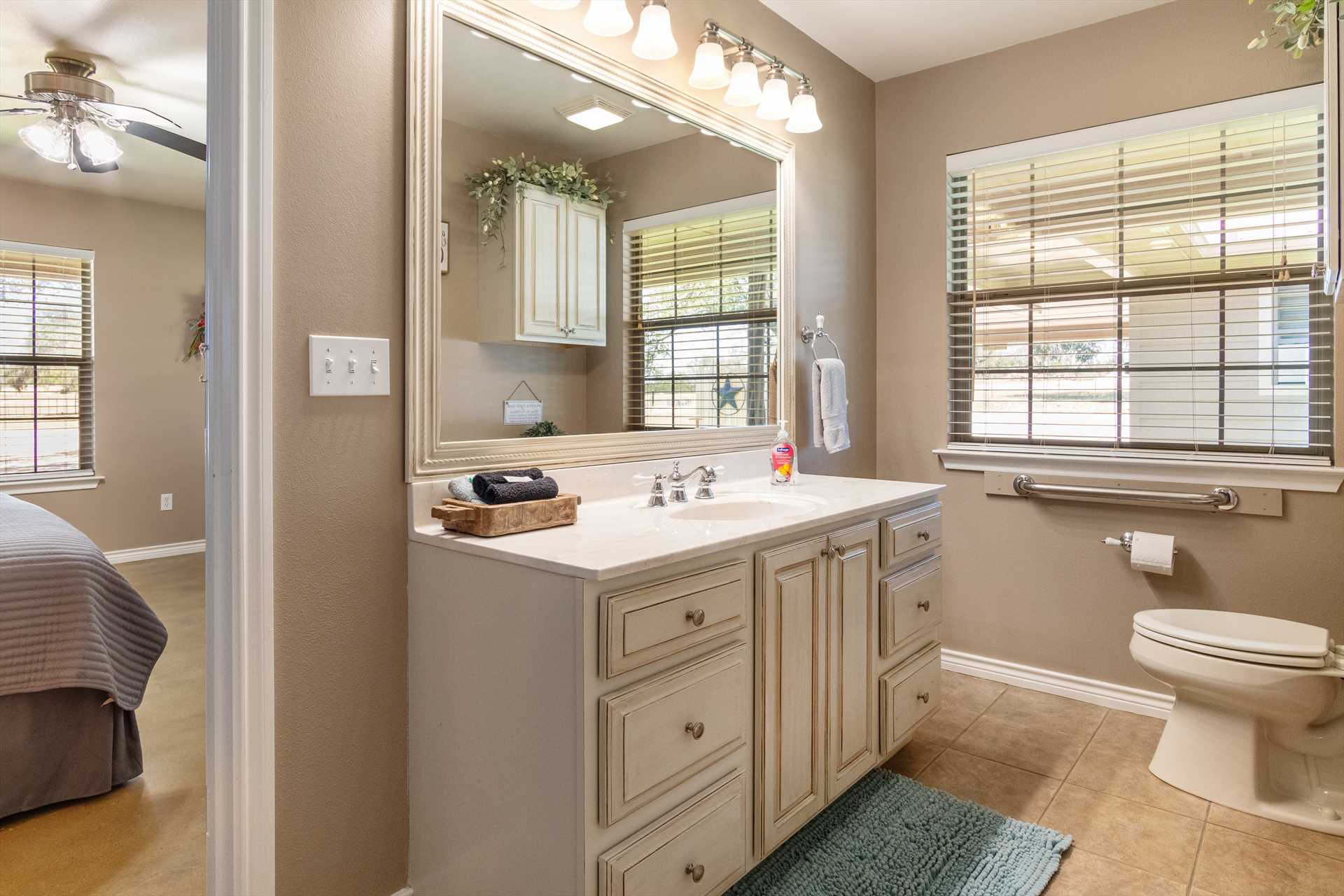                                                 Both full baths here are convenient to the bedrooms, and are decked out in fresh linens, too.