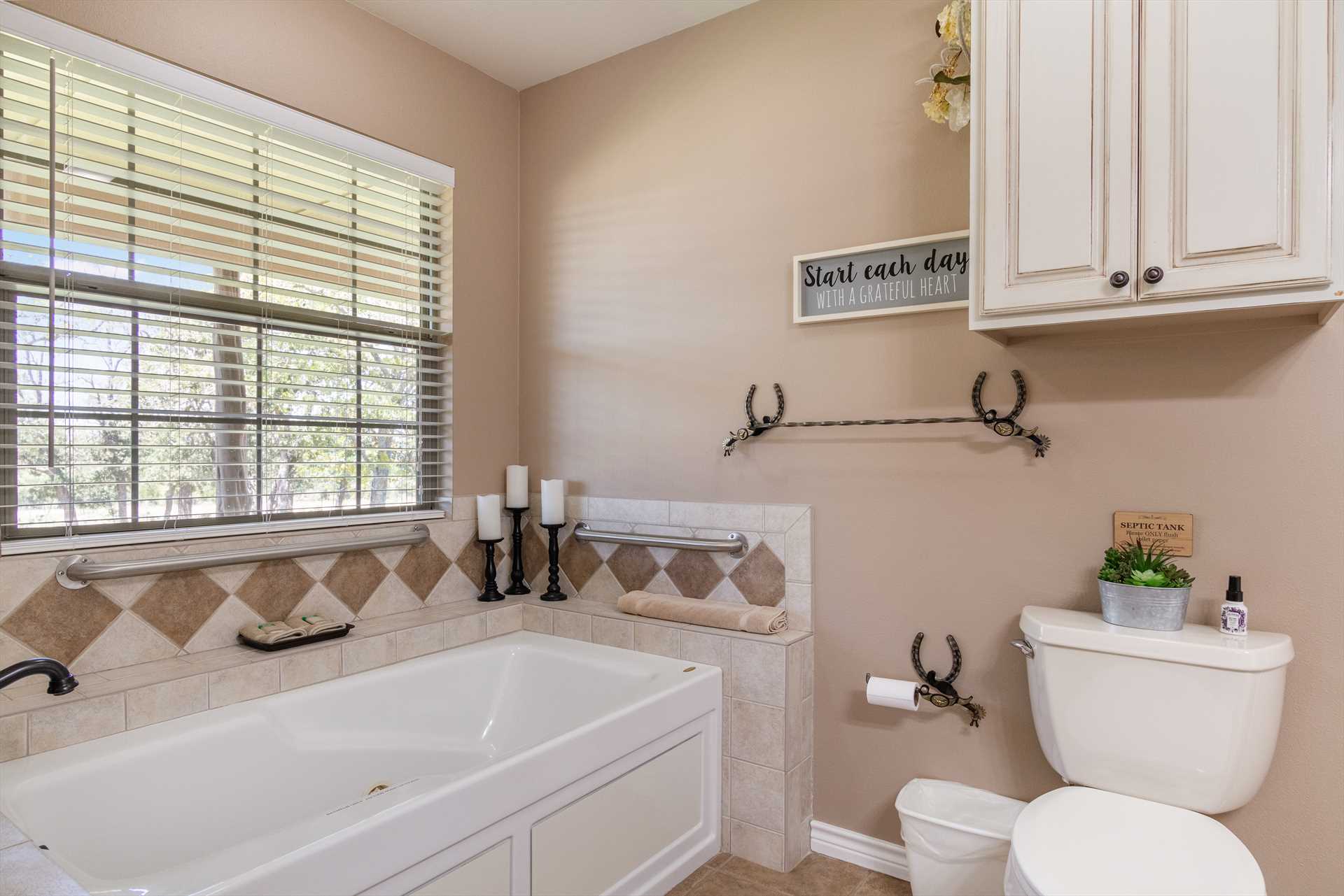                                                 Essential toiletries and clean linens can be found in all the bath spaces at Omie's.