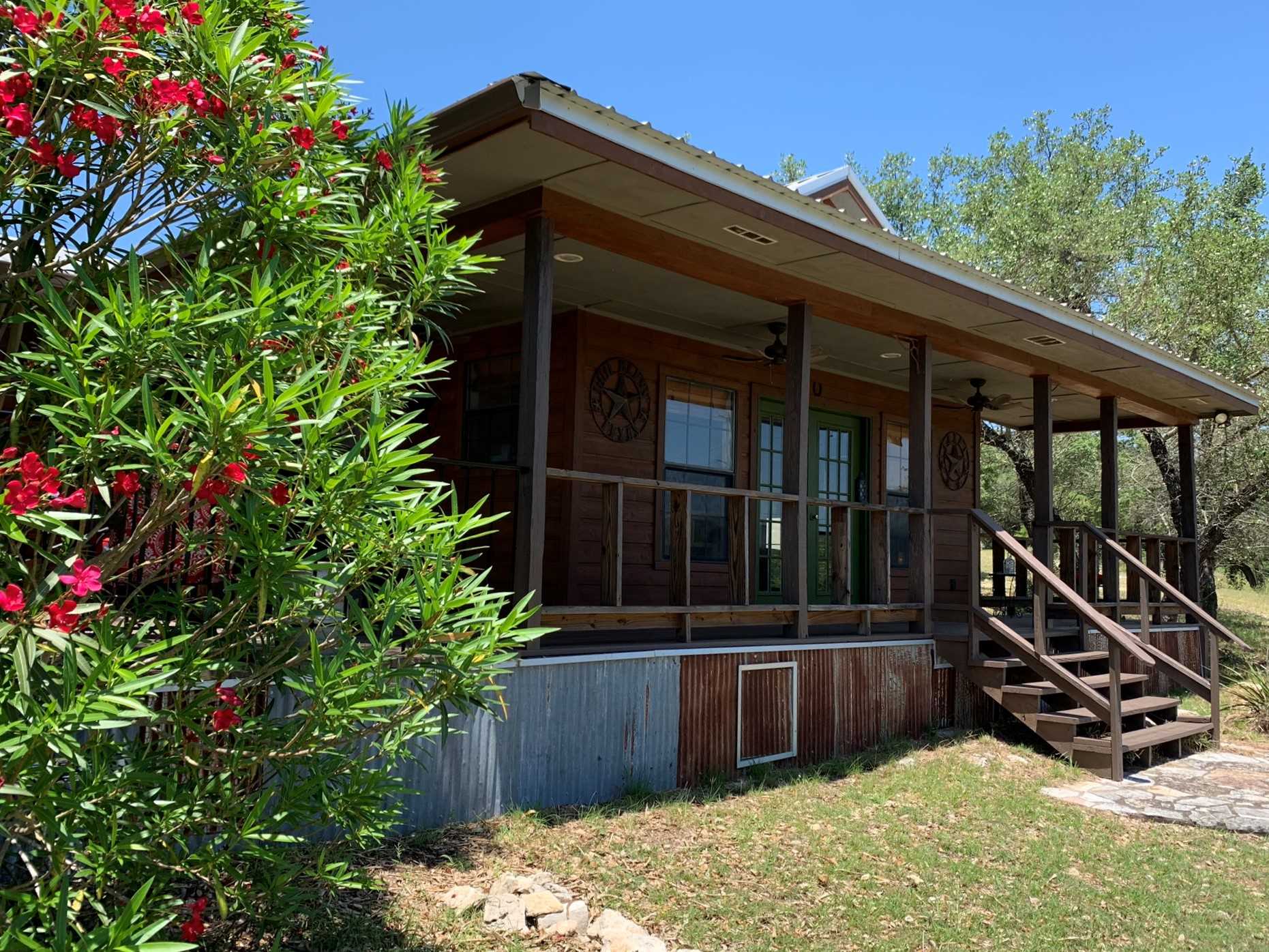                                                 This sweet romantic cabin sits on ten beautiful acres, remote yet convenient to fascinating Hill Country towns.
