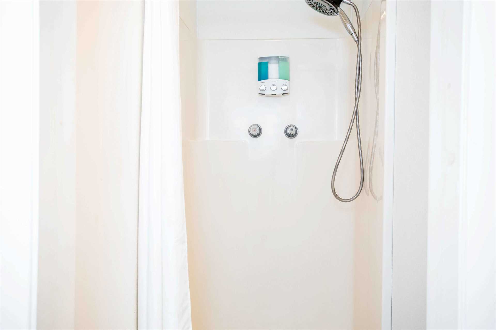                                                 Showers are installed in both bathrooms for convenient and easy cleanup!