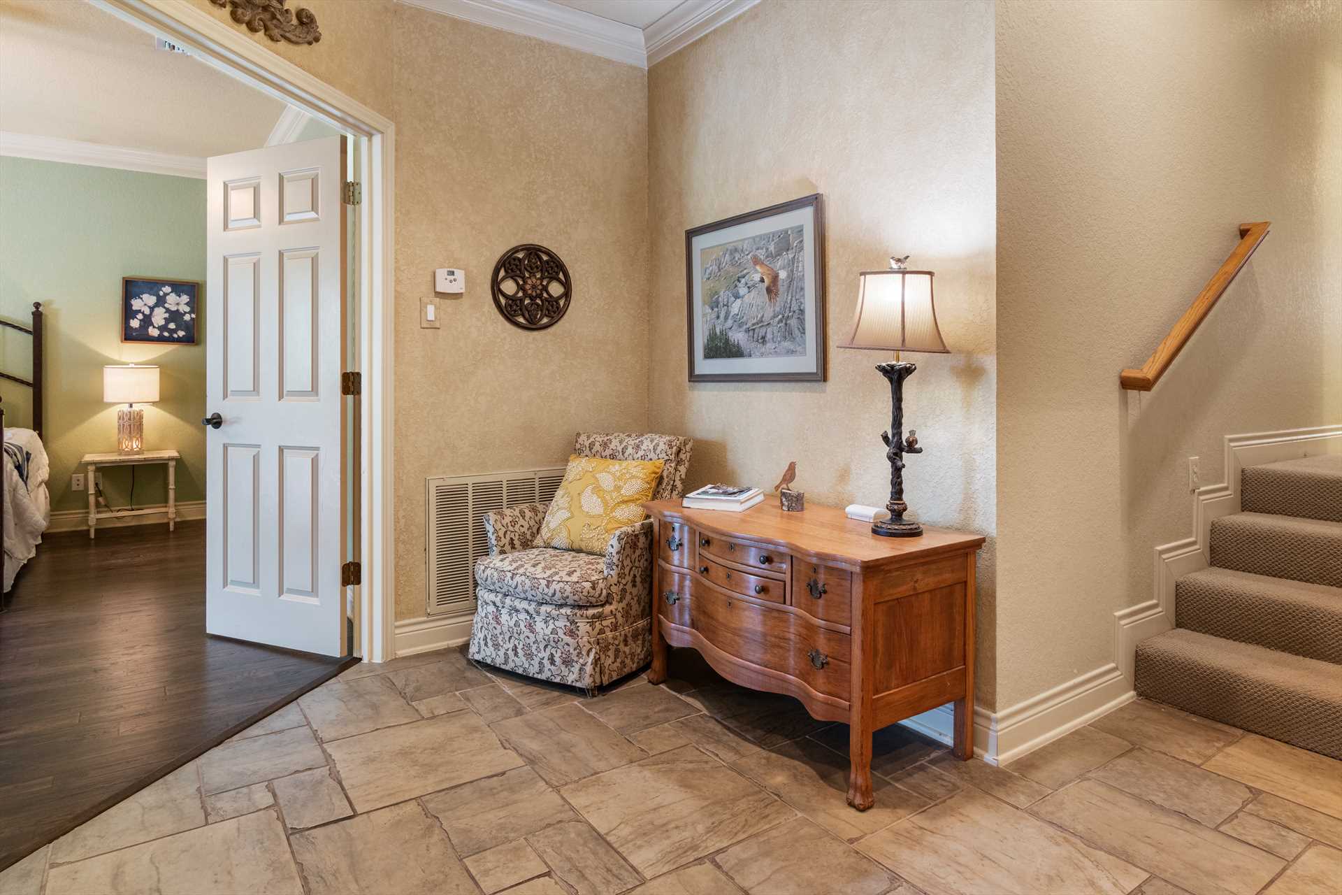                                                 Right outside the master bedroom, there's an intimate and private little reading nook!