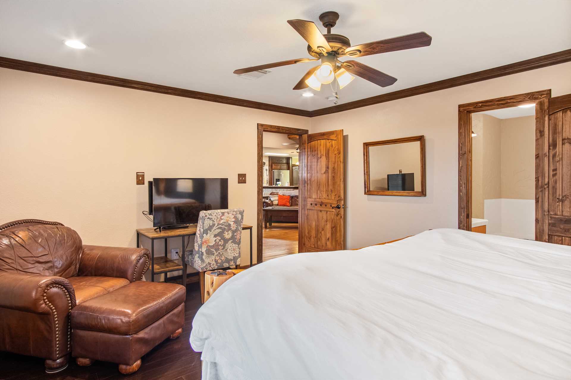                                                 Three people will find restful slumber in the master bedroom, with a king-sized bed and single fold-out bed.