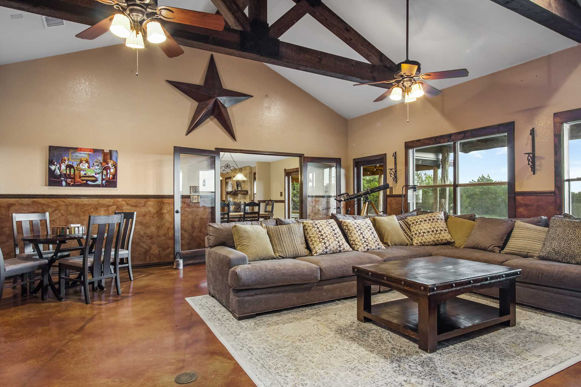                                                 Lone Star touches and stone work throughout the retreat give it a robust and welcoming ranch feel.