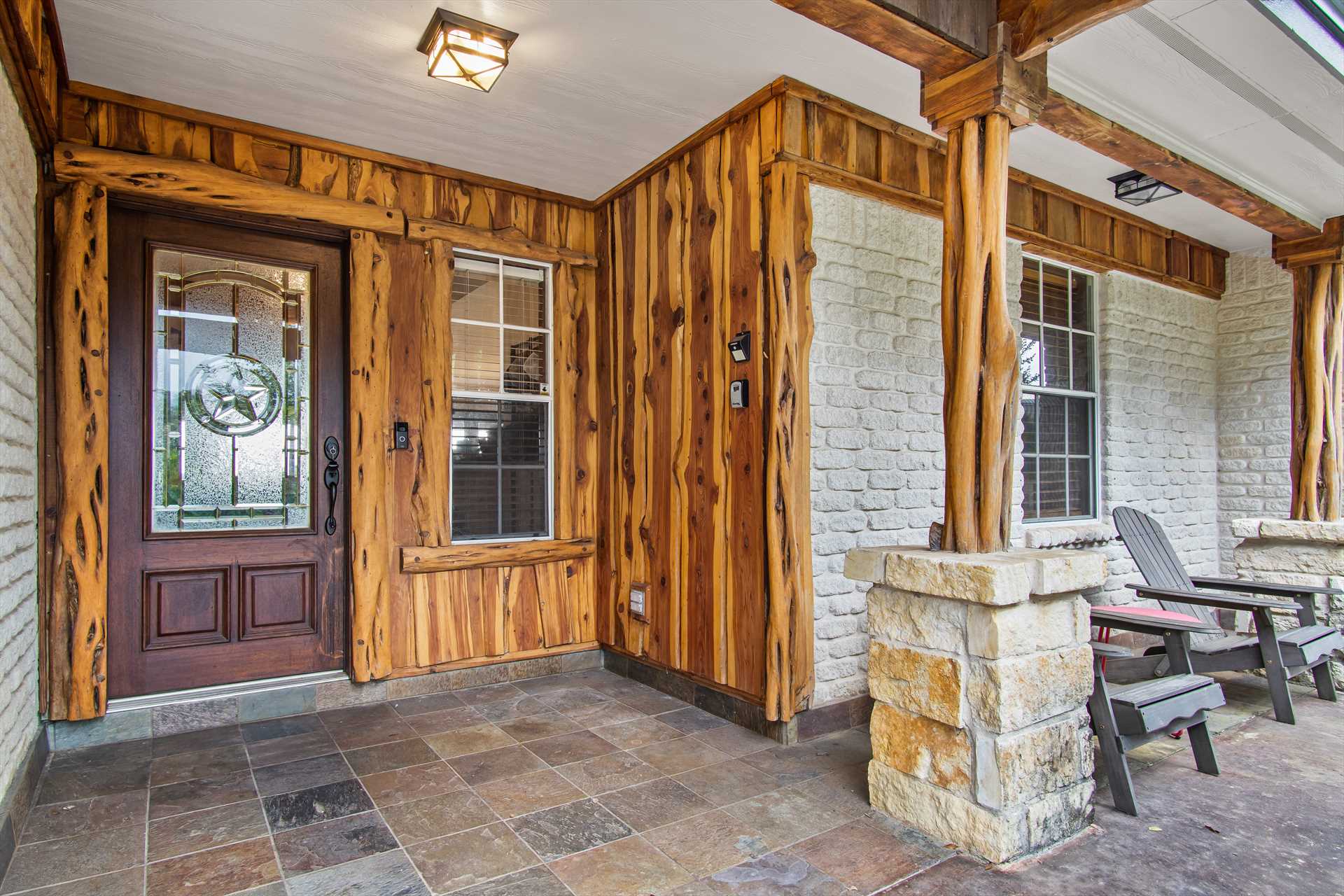                                                 Bold and rustic stone and woodwork construction give the Retreat a regal and authentic ranch-like look.