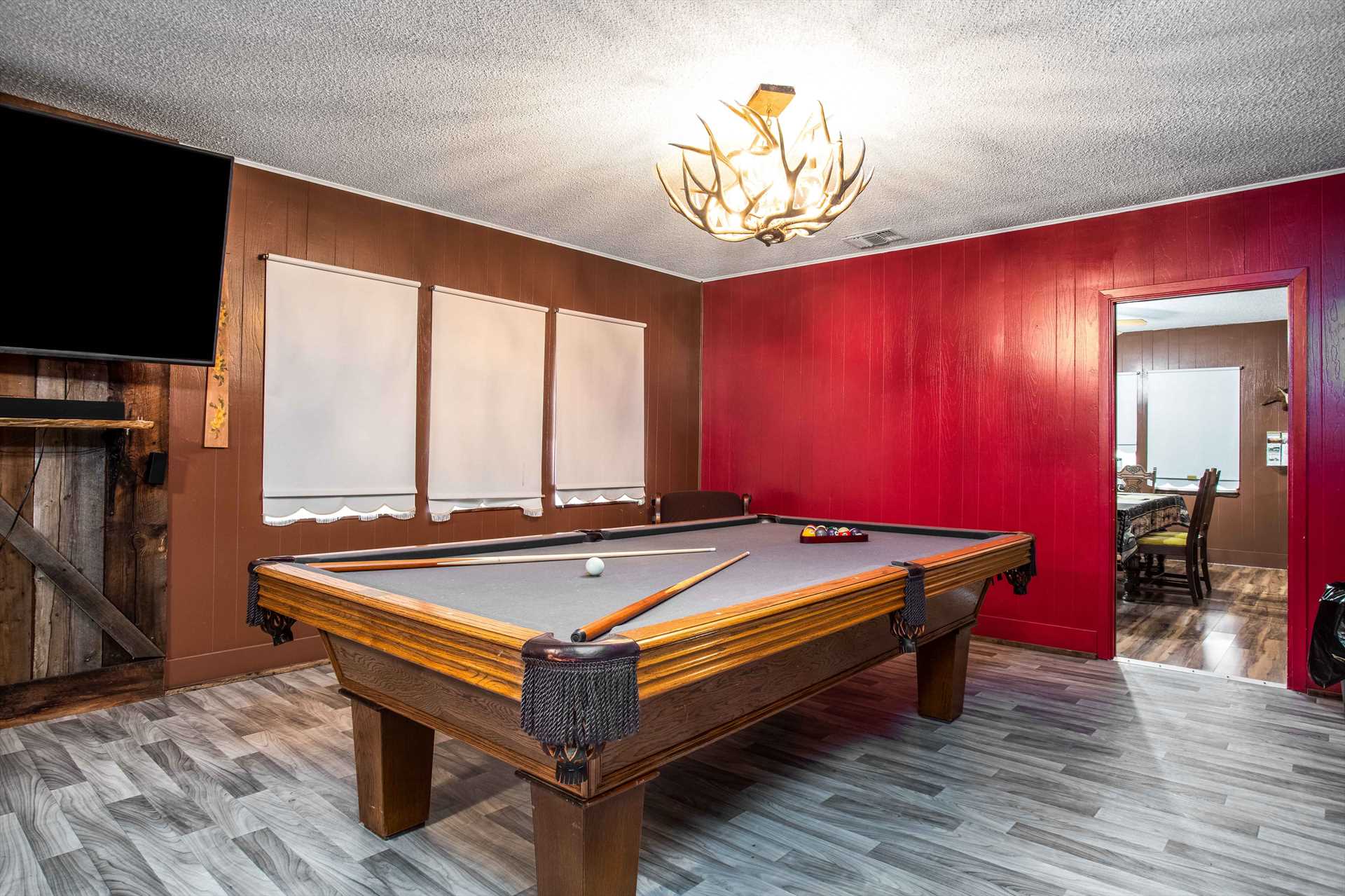                                                 Rack 'em up and enjoy a game on the old-style drop pocket pool table!