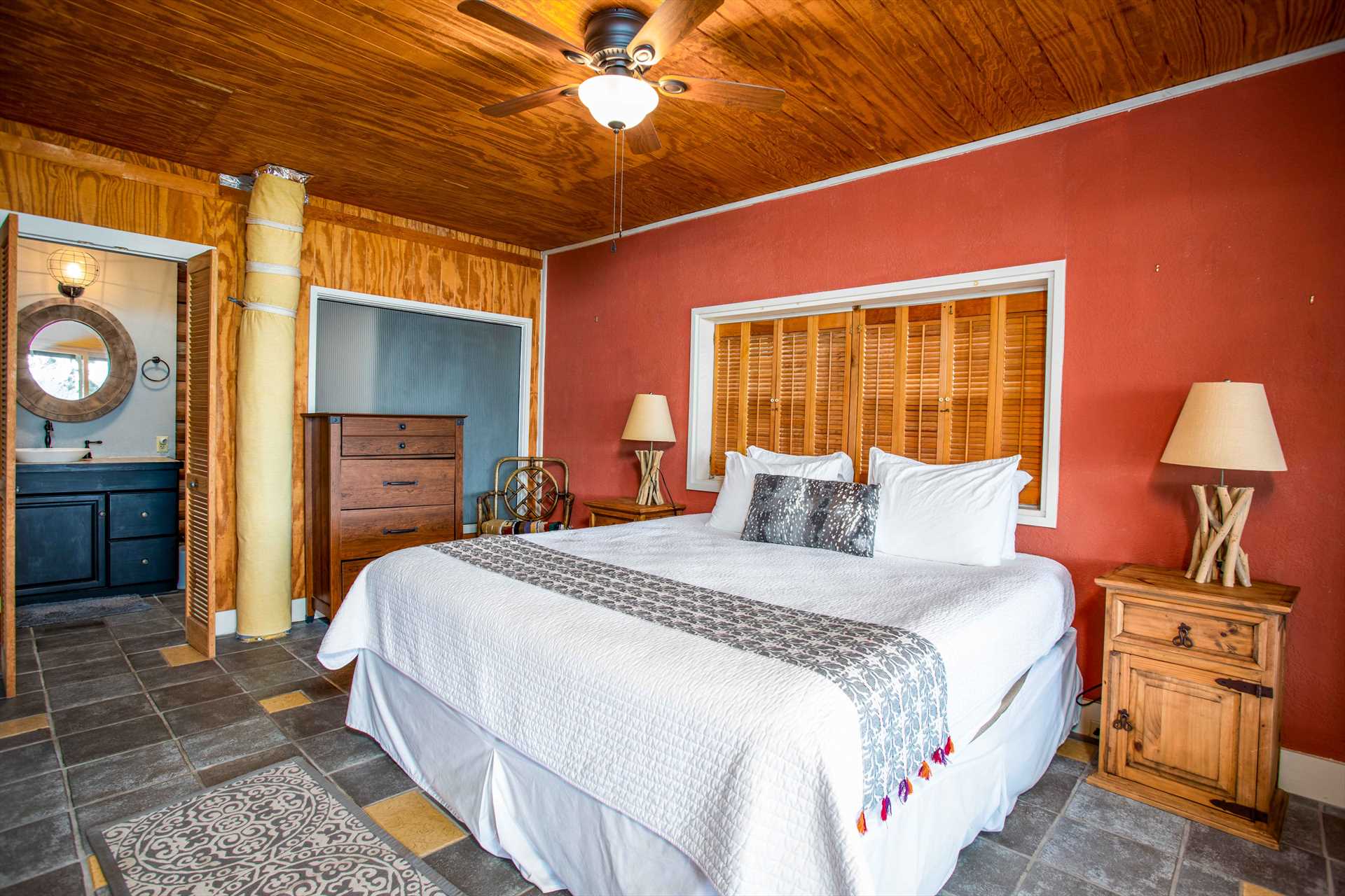                                                 The spacious and stylish master suite features a roomy and comfortable king-sized bed. All bed and bath linens are provided, as well.