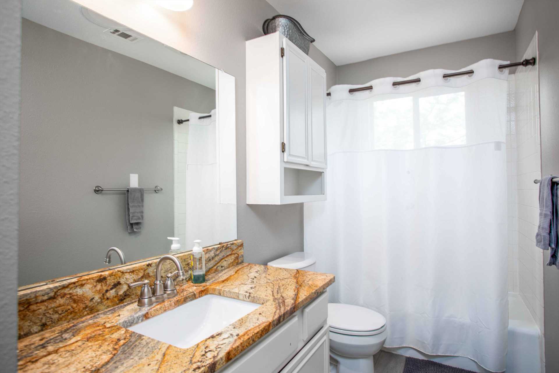                                                 The full bath features a tub and shower combo, and both baths are super-clean, with fresh linens included.