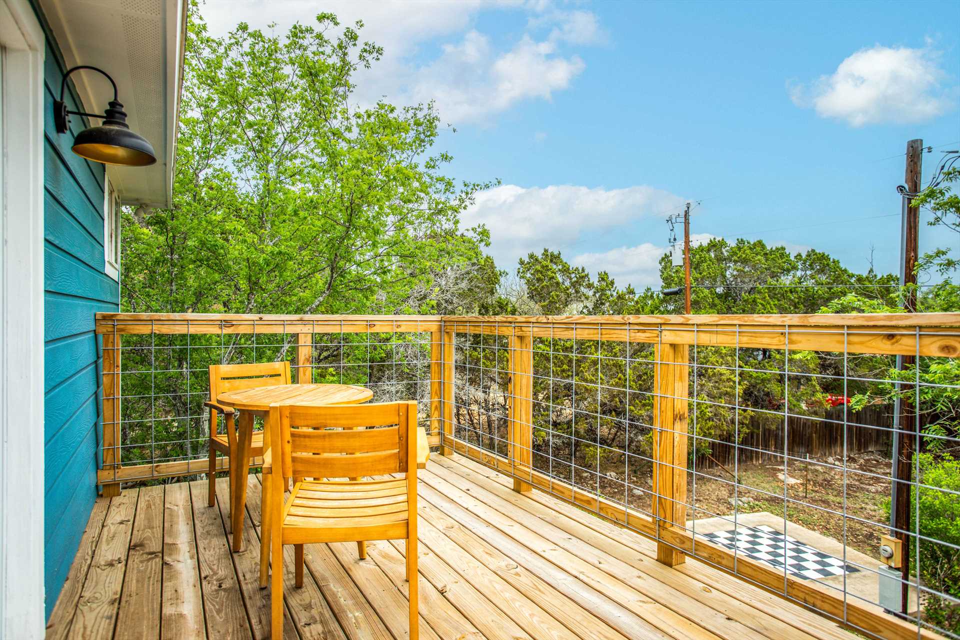                                                This scenic deck is right outside the master bedroom, it's the perfect place for a quiet cup of coffee or glass of wine.