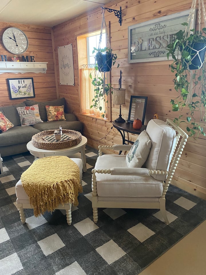                                                Plants, carefully-selected decorative pieces, and plenty of natural light makes the Knotty Pine Cottage a wonderful and relaxing guest HOME-not just a place to dump your luggage.
