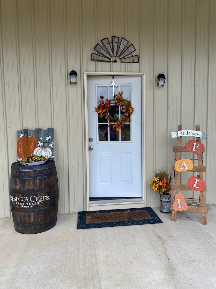                                                 Welcome to the Knotty Pine Cottage! Beyond this door lies your relaxing Hill Country escape.