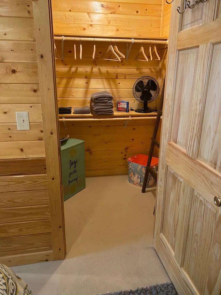                                                 Knotty Pine's bedroom has a walk-in closet, with plenty of storage space!