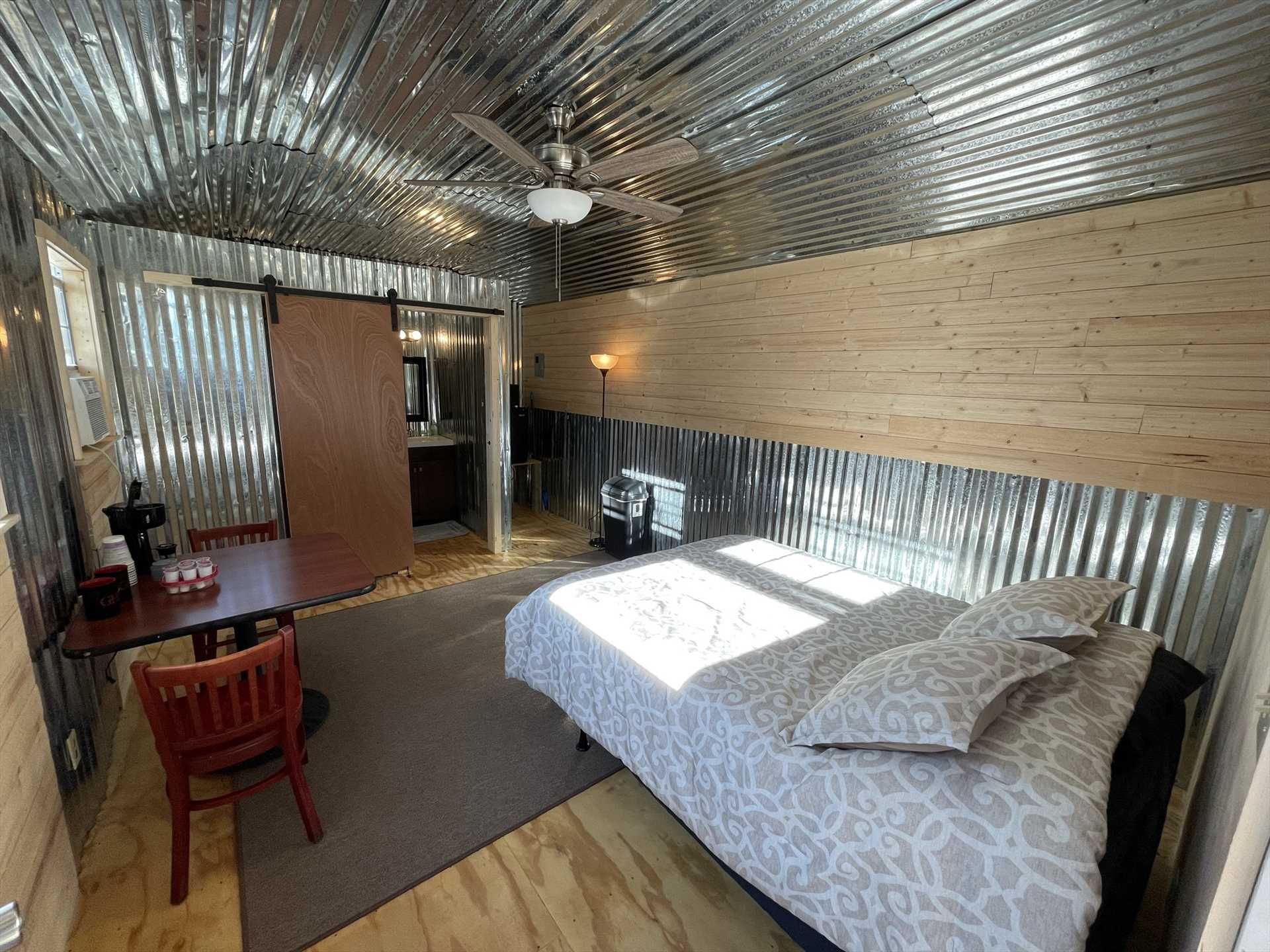                                                 The plush queen bed provides peaceful slumber in this romantic getaway, and a roll-away bed is also available for a third person upon request.