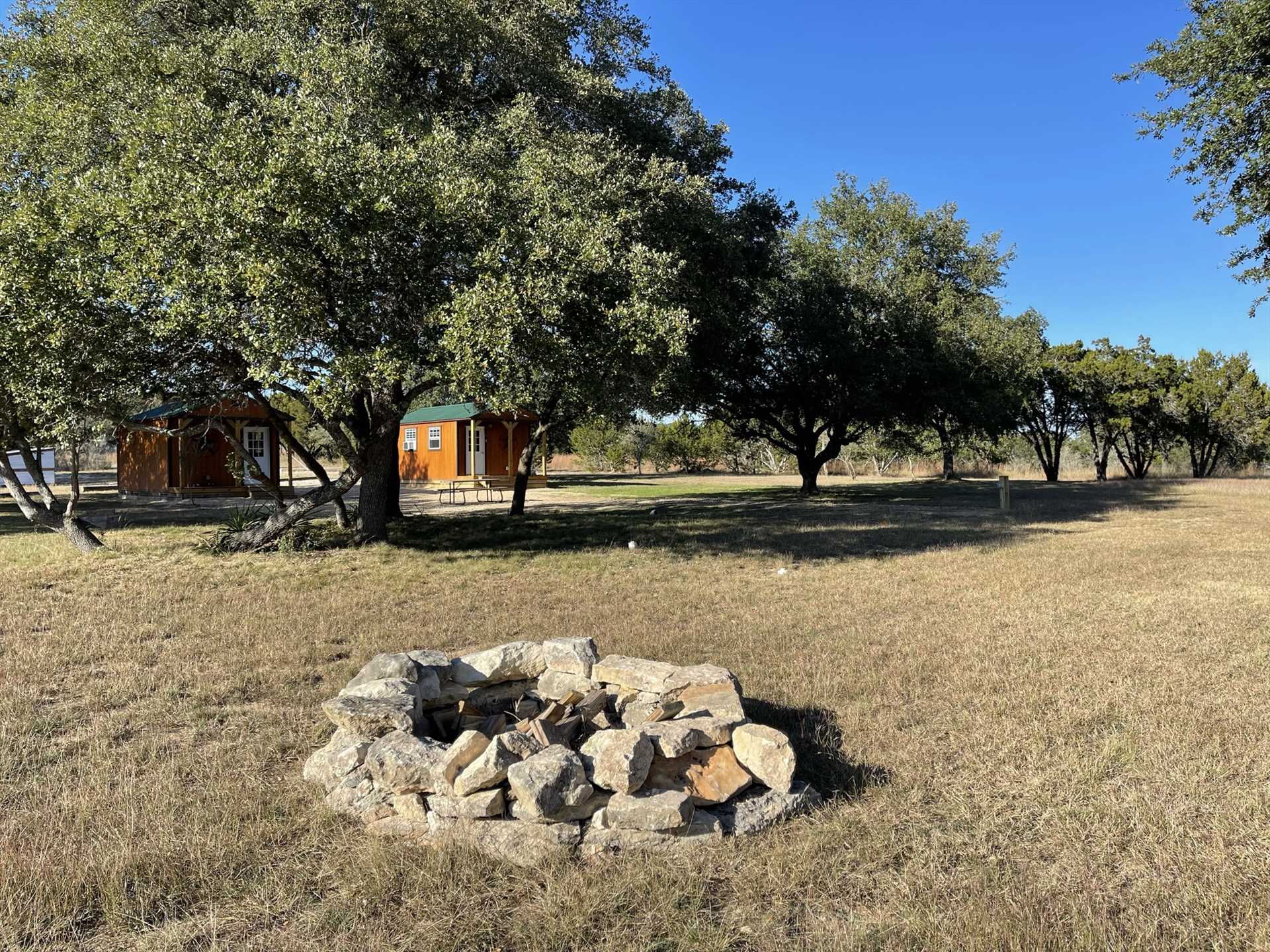                                                 Gather around the fire pit for conversation, laughter, and s'mores in your Hill Country escape! There's also a charcoal pit for grilling.