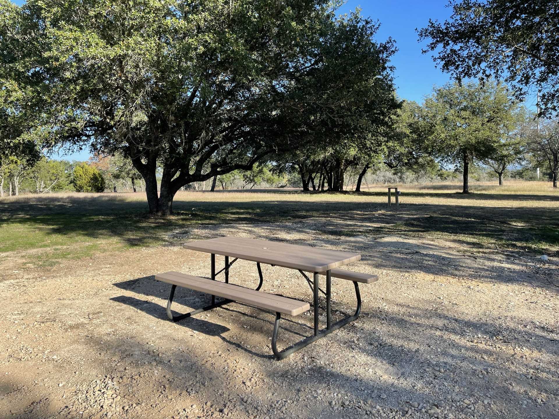                                                 Your outdoor space at the Great Heart Ranch Edwards Cabin includes a horseshoe pit, so warm up your throwing arm!