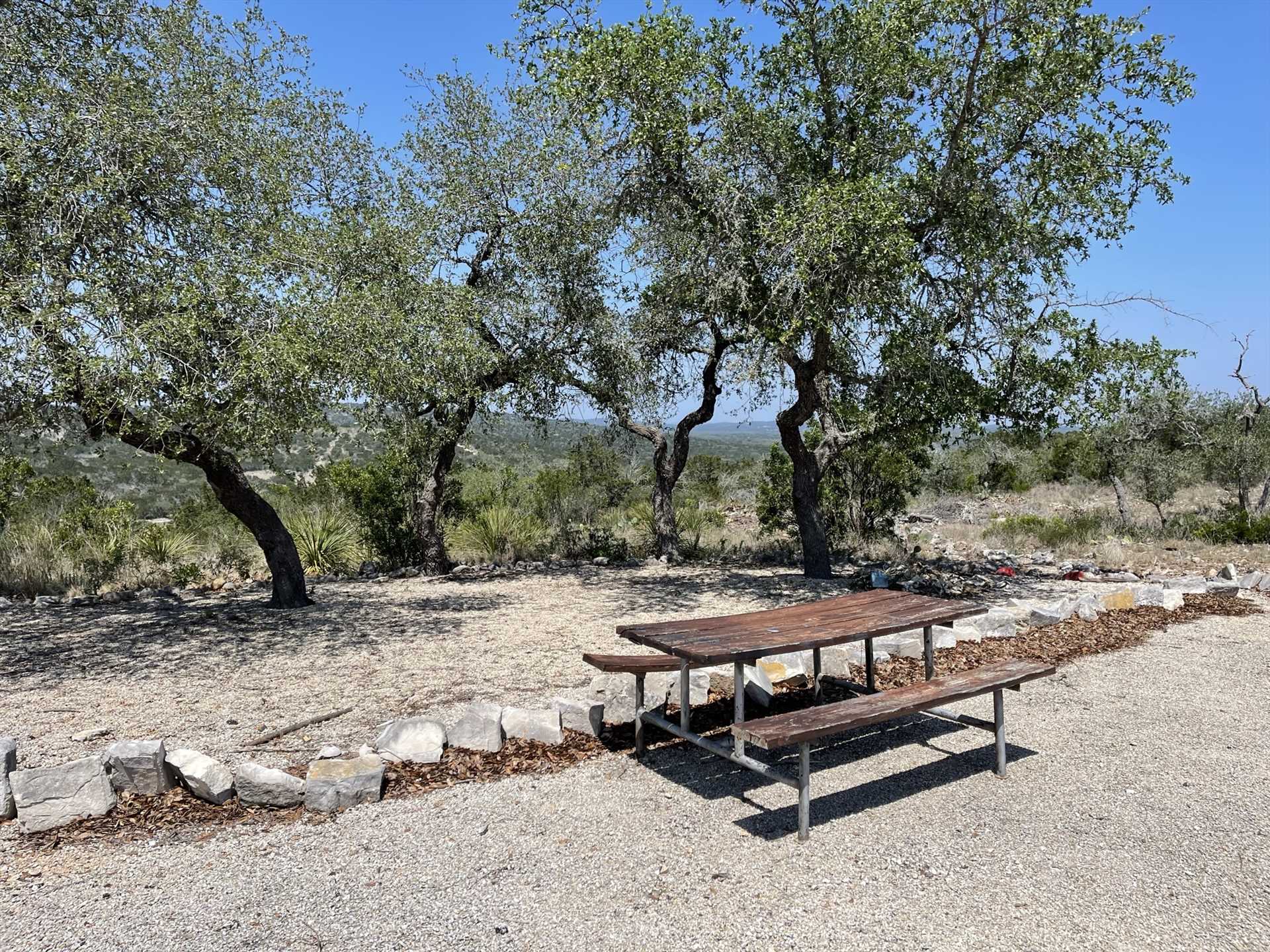                                                 A picnic table, a gas grill nearby, fresh Hill Country air, and inspiring views: sounds like the recipe for a great Texas cookout!