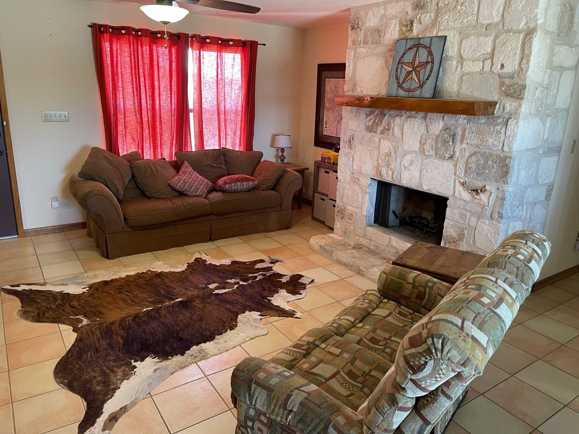                                                 Comfort is key at the Texas Longhorn Cabin! From plush furniture to a stone fireplace to central air and heat, you'll feel right at home.