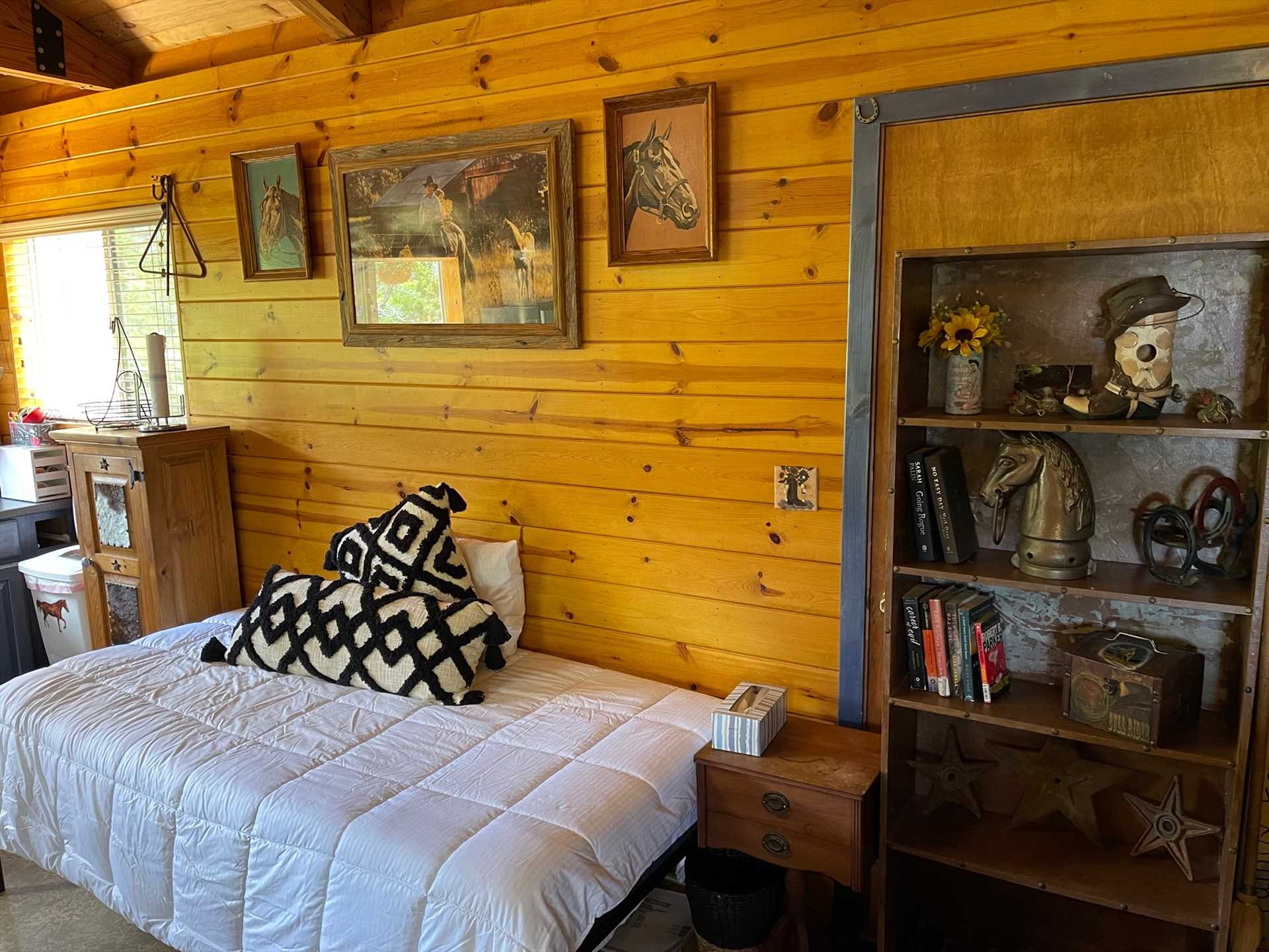                                                 Giddy Up also has a daybed that can sleep up to two small children...but you might want to use the cozy guest cabin as a romantic escape for two!
