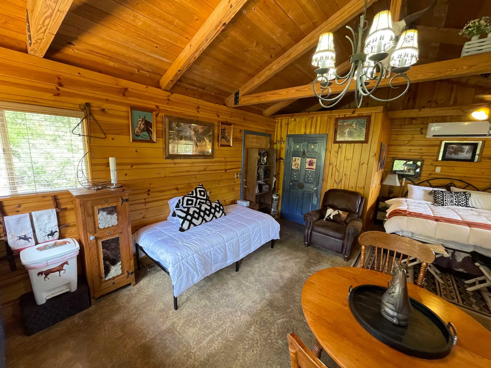                                                 AC and heat make the interior temp just right year round, and the dazzling woodwork gives the cabin its own unique glow.