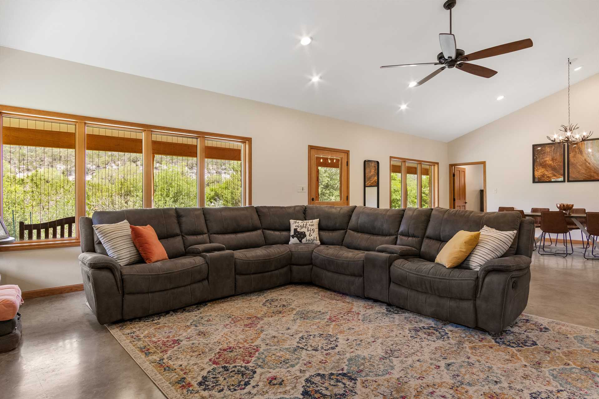                                                 Everyone will have plenty of leg-stretching space on the living room's plush and comfy gigantic sectional sofa!