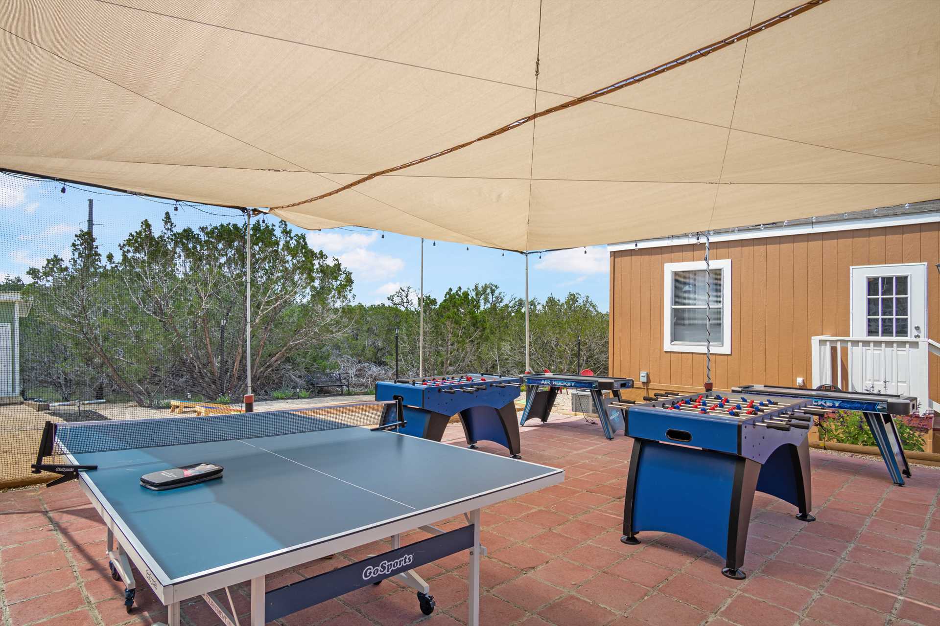                                                 Enjoy your air hockey, ping pong, and foosball games in cool comfort! The tables are nicely shaded against the Texas sun.