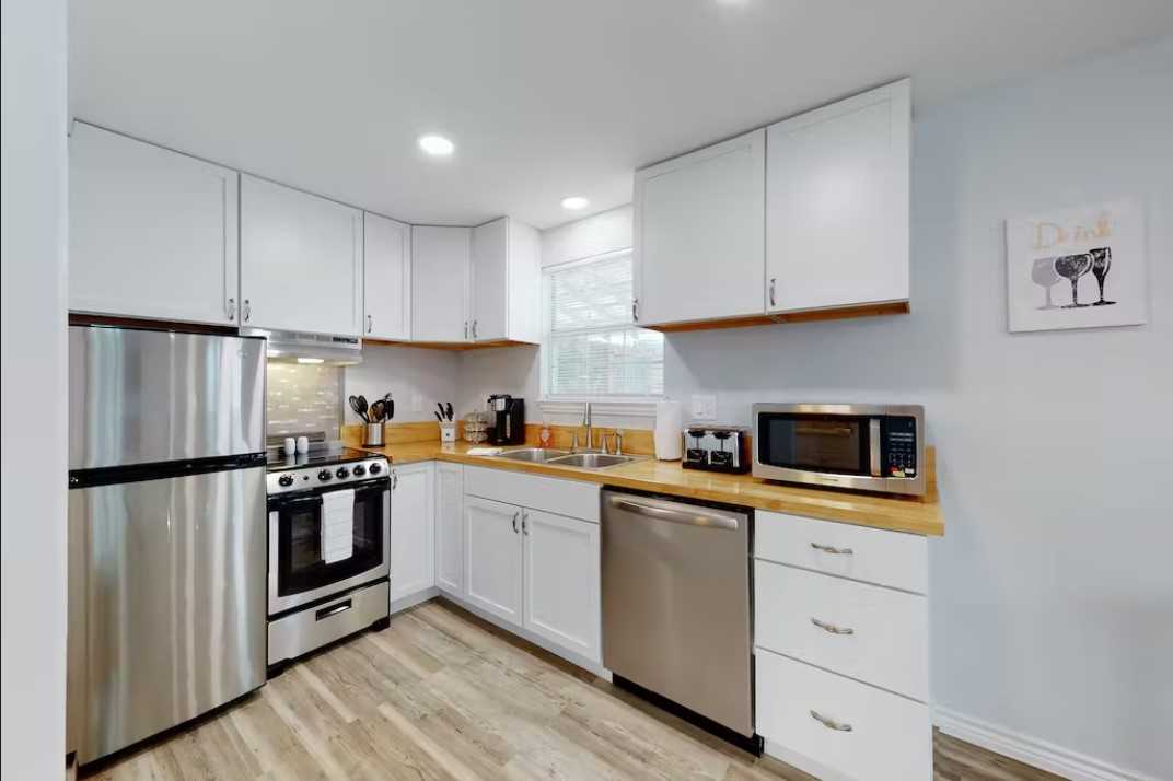                                                 A dishwasher and K-Cup coffee maker are among the gleaming new appliances you'll find in the Oasis' kitchen.