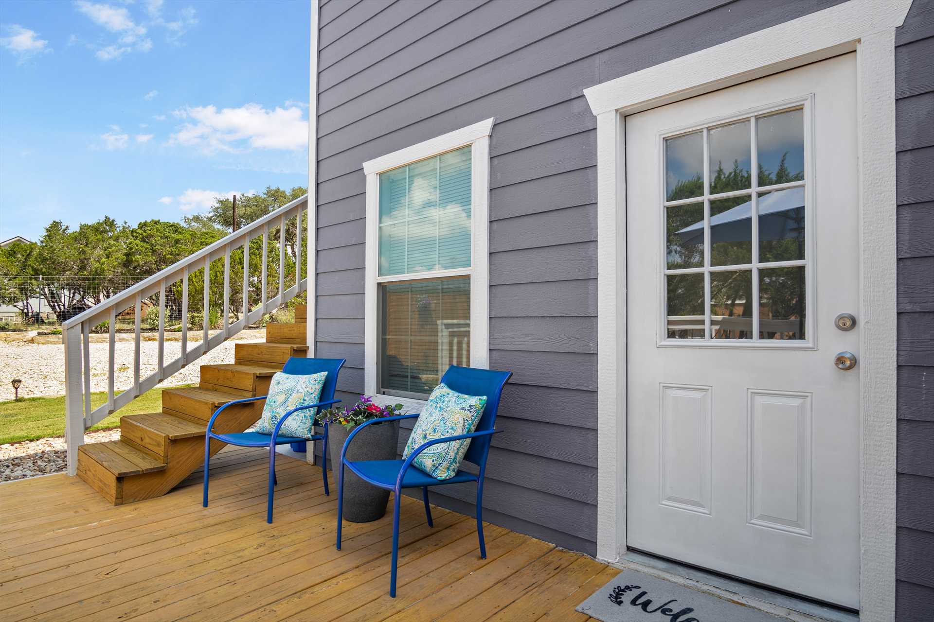                                                 For more intimate conversation, there's a cozy corner of the deck where two can chat privately.
