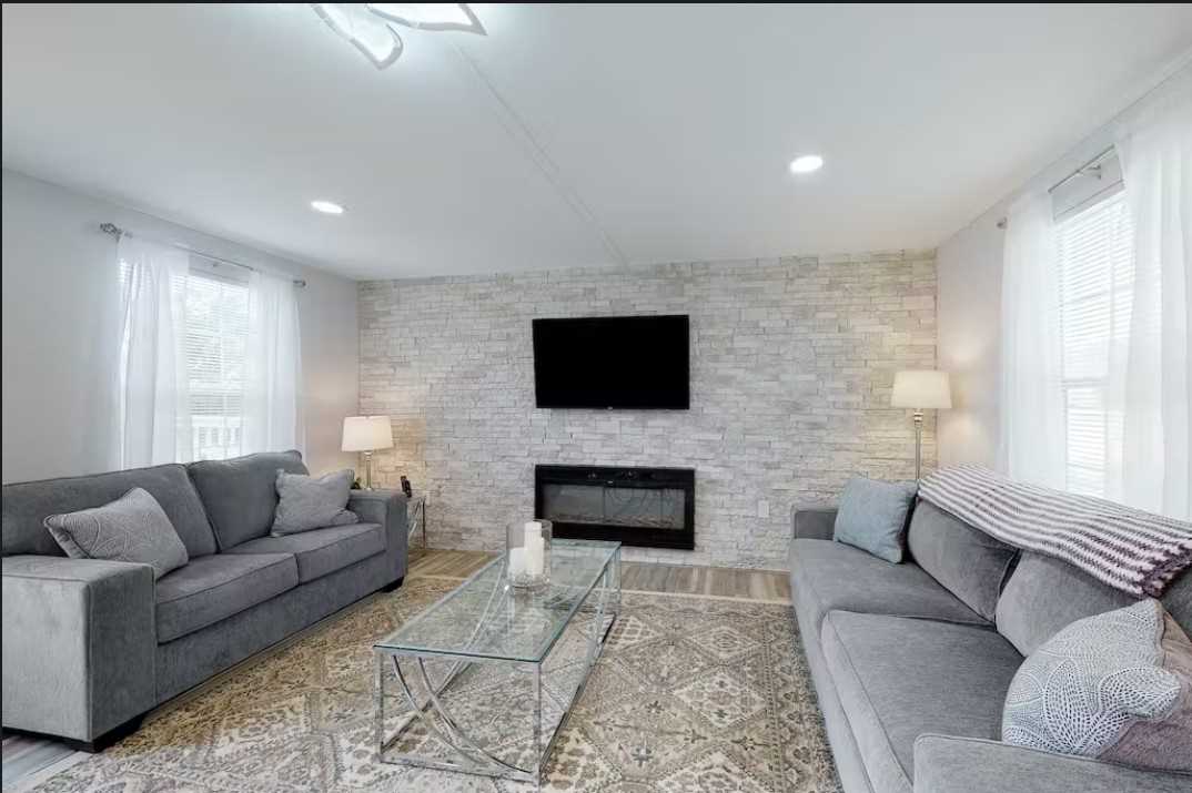                                                 Central air, an electric fireplace, a Roku-ready smart TV, and Wifi make the Oasis' living area an awesome place for movie nights!