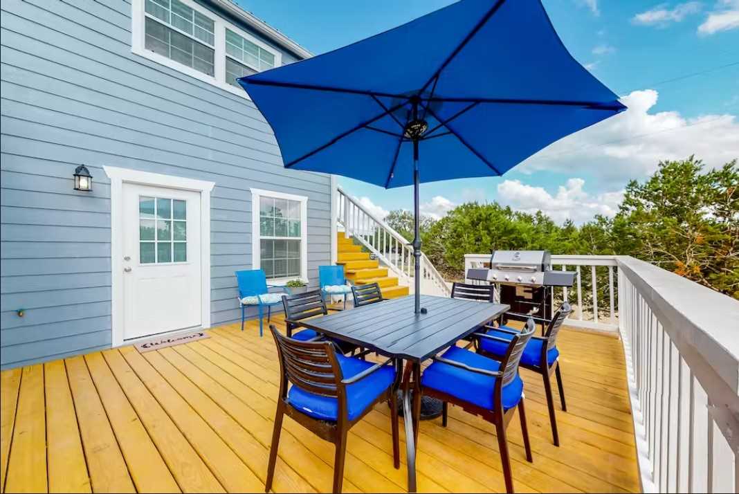                                                 Chat, watch wildlife, and just relax under the big umbrella on the open side of the lower deck!