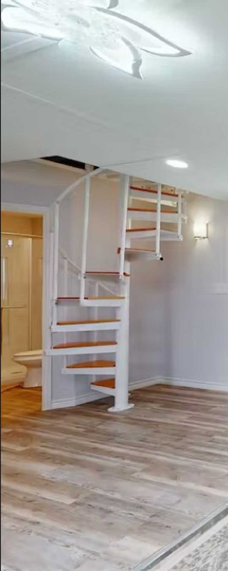                                                 A unique spiral staircase leads to the bedrooms upstairs, for those with reduced mobility, a more user-friendly staircase can be found out by the lower deck.