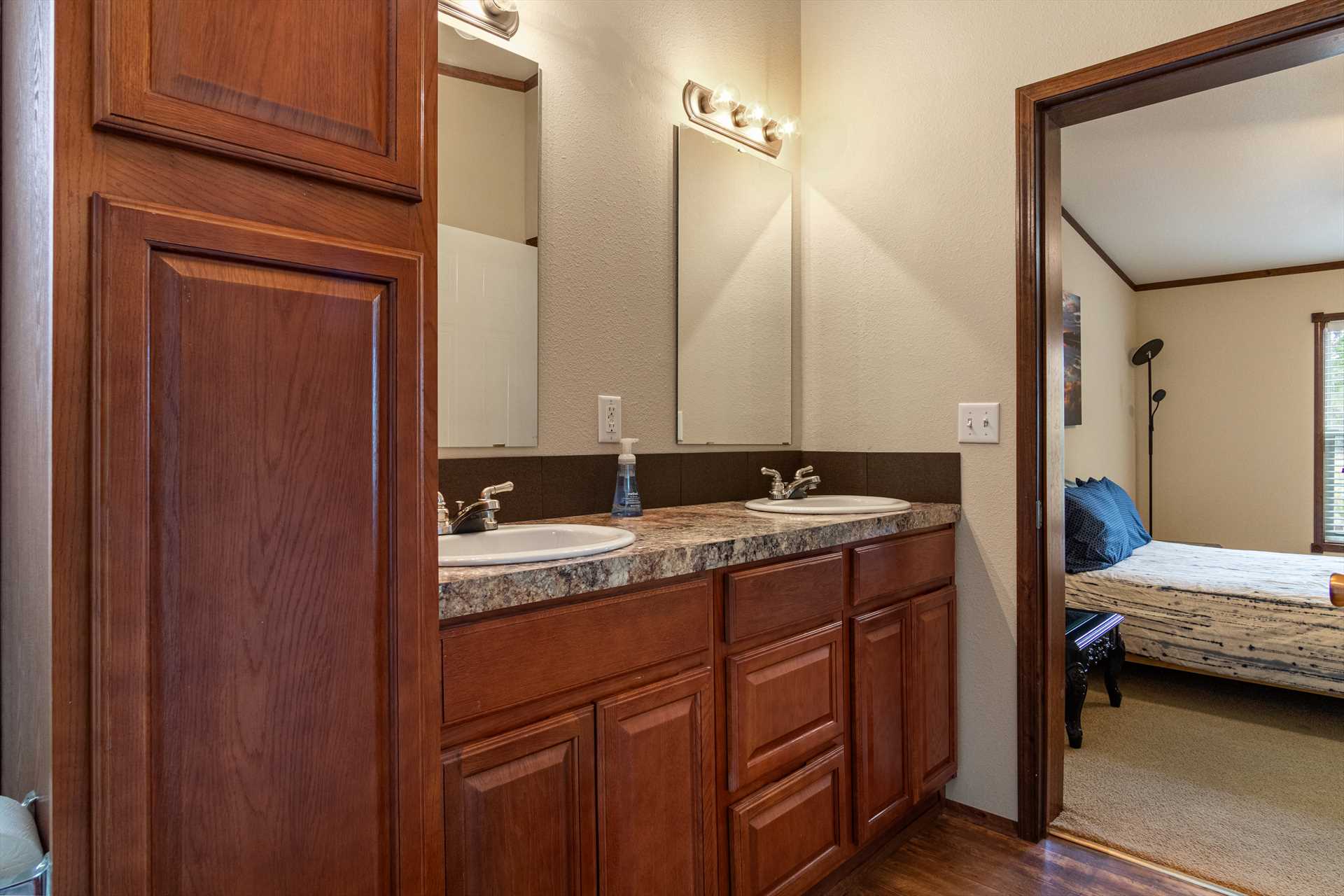                                                 The master bath includes twin vanities, and both full baths at the Hideaway include clean linens.