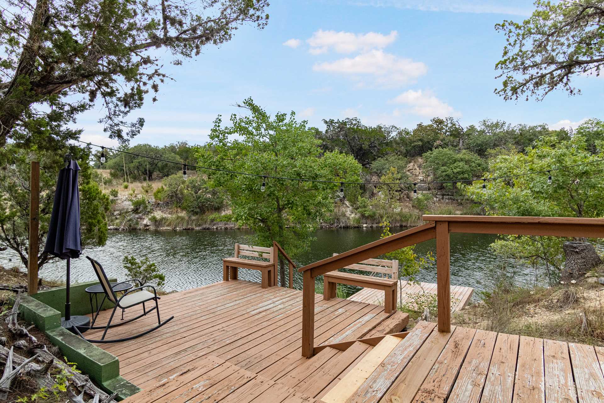                                                 The Hideaway's dock offers access to the water, and it's a nice and peaceful spot to just kick back and relax, too.