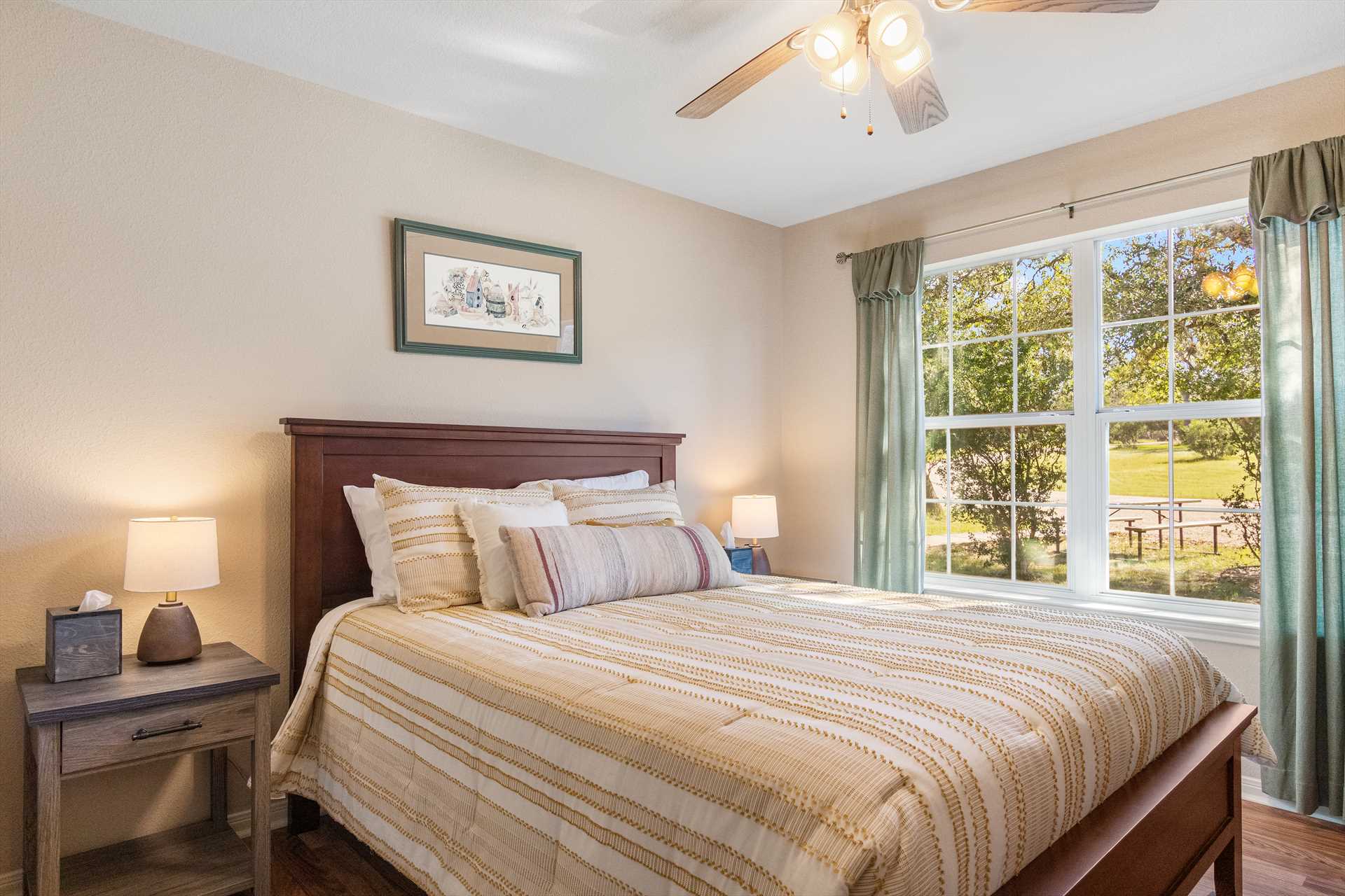                                                 The third bedroom has a queen-sized bed, and all bedrooms have windows to let in natural light, and ceiling fans for added comfort.