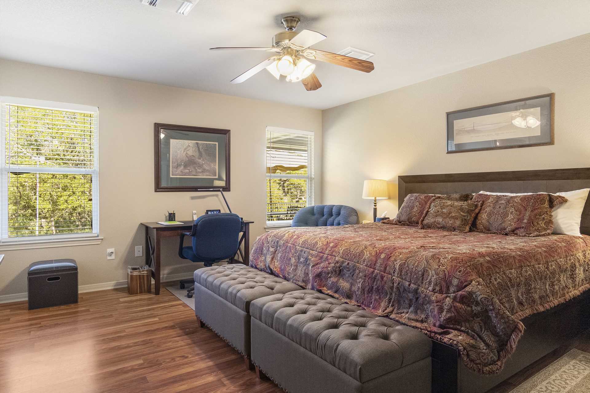                                                 The master bedroom features a huge and comfortable king-sized bed, and there's also a dedicated work station where you can catch up with the rest of the world!