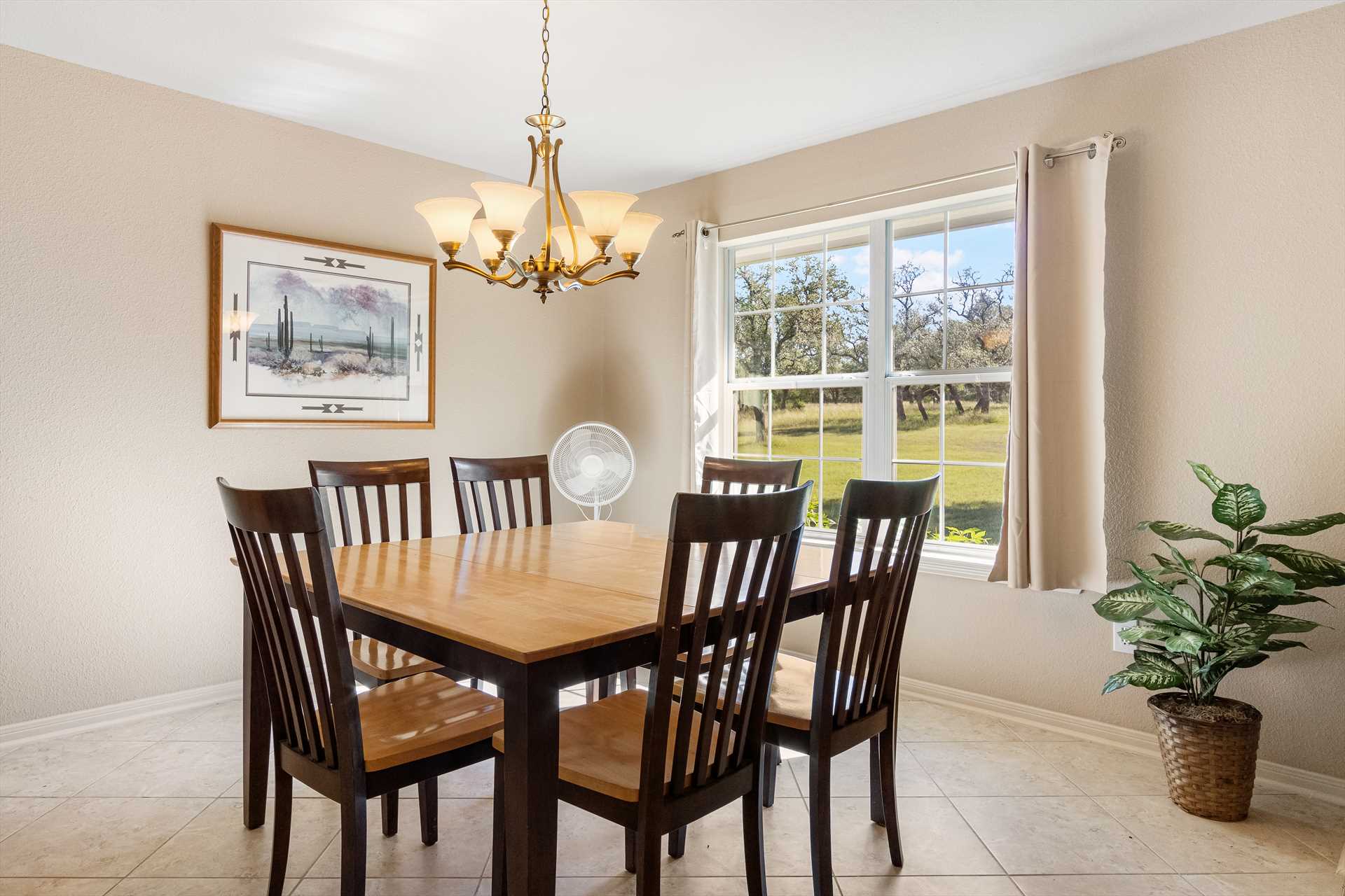                                                 With two dining tables and bar-style seating surrounding the kitchen, there's all kinds of seating options during food prep and when your crew sits down to eat!