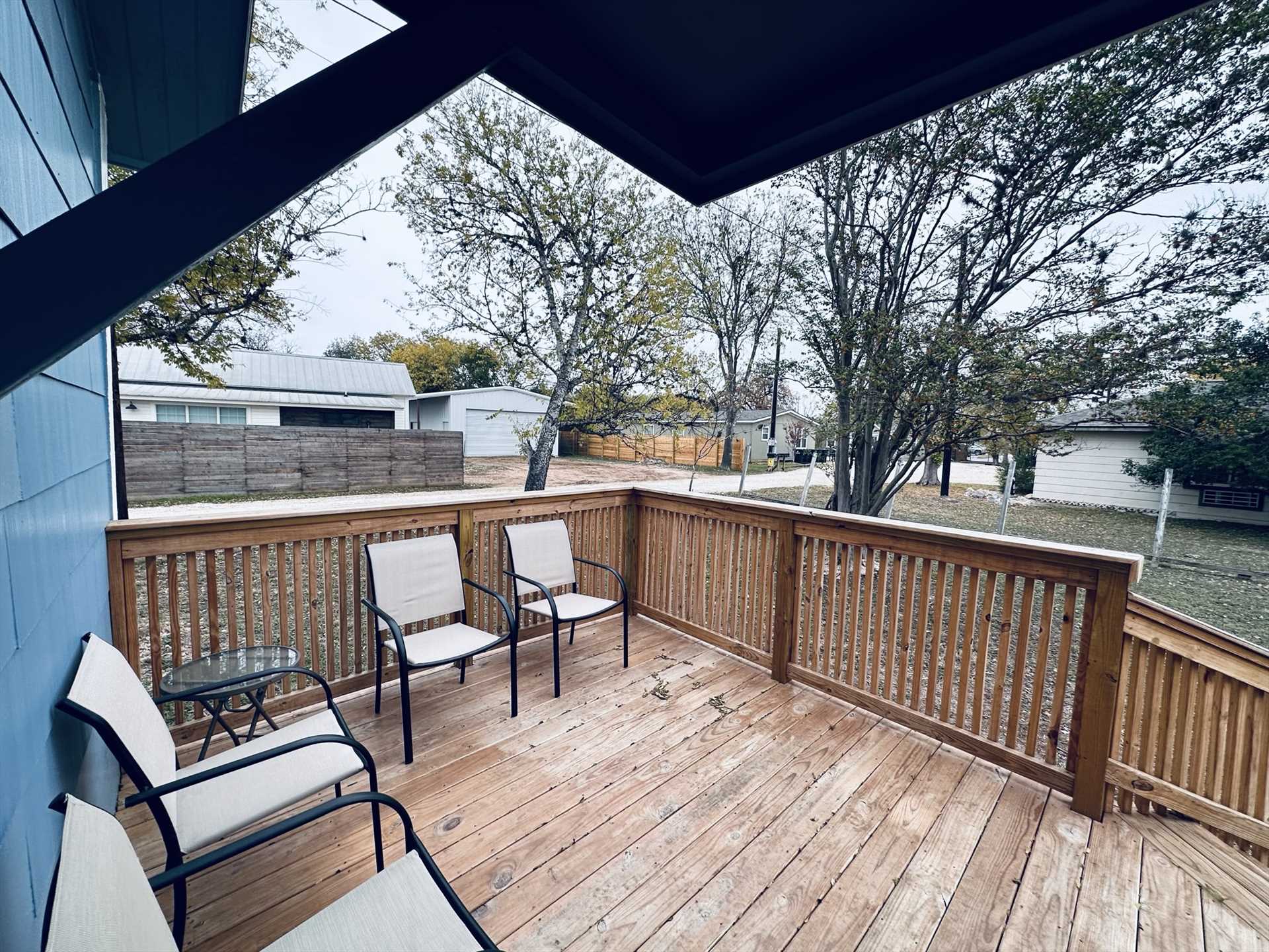                                                 The back deck is furnished with plenty of outdoor furniture. It's a great place to mingle, enjoy the fresh air, and relax!